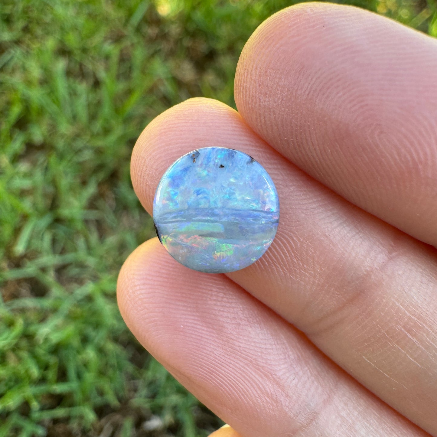 2.76 Ct small round pastel boulder opal