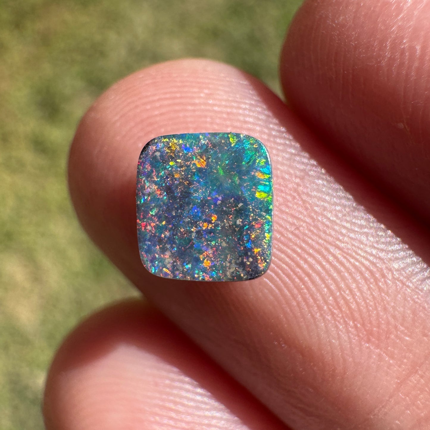 1.05 Ct small rainbow boulder opal