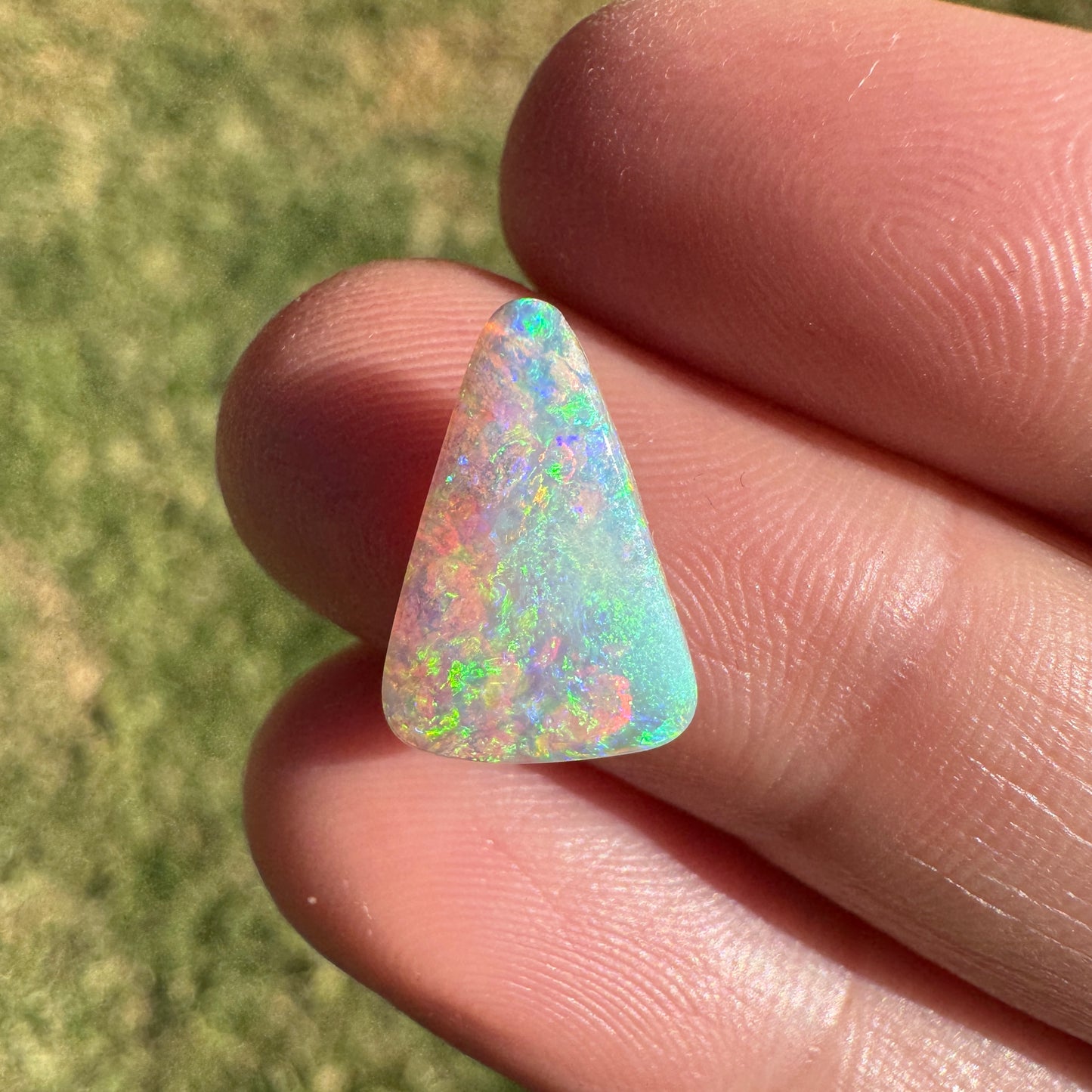 2.06 Ct bright green crystal boulder opal