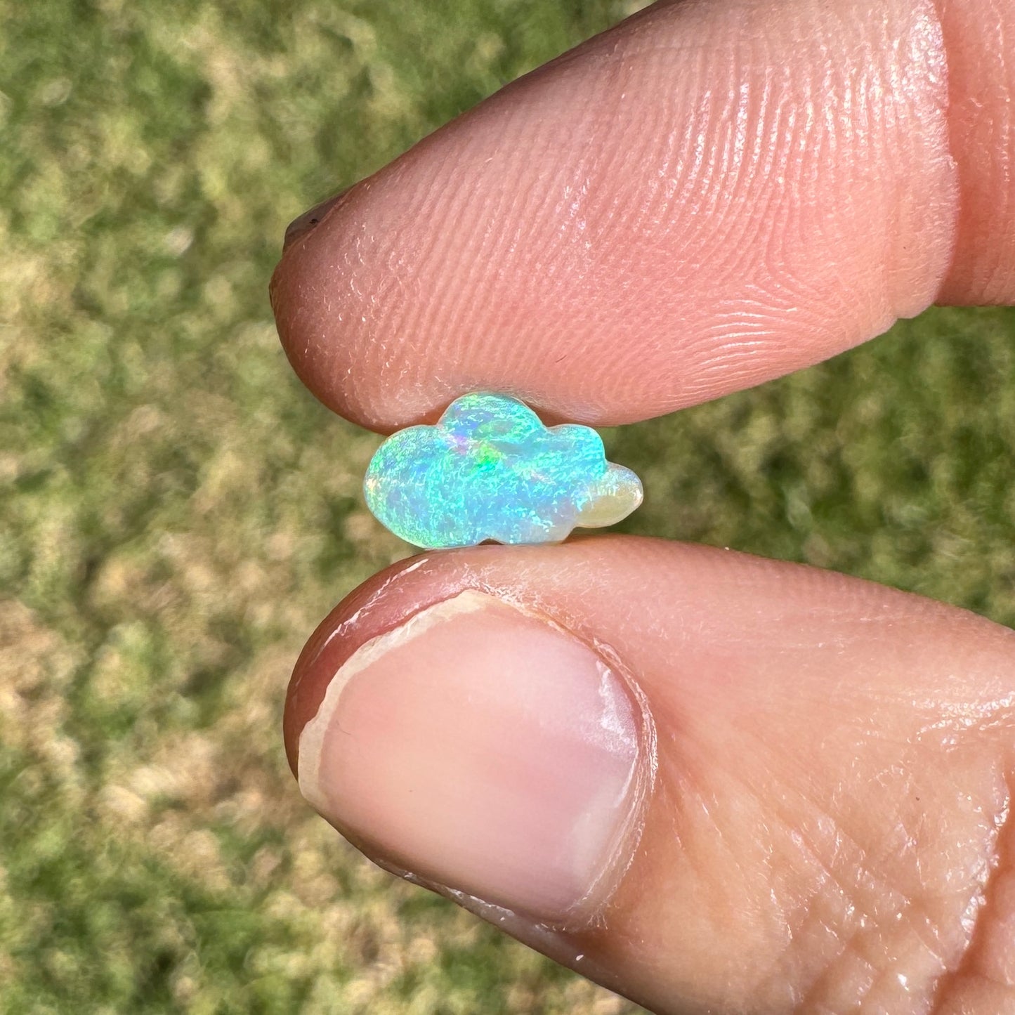 0.57 Ct extra small cloud carving crystal opal