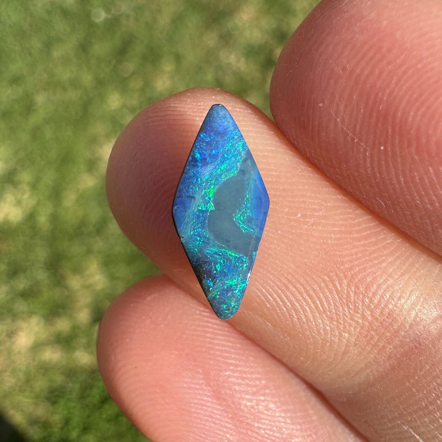 1.54 Ct small green-blue boulder opal