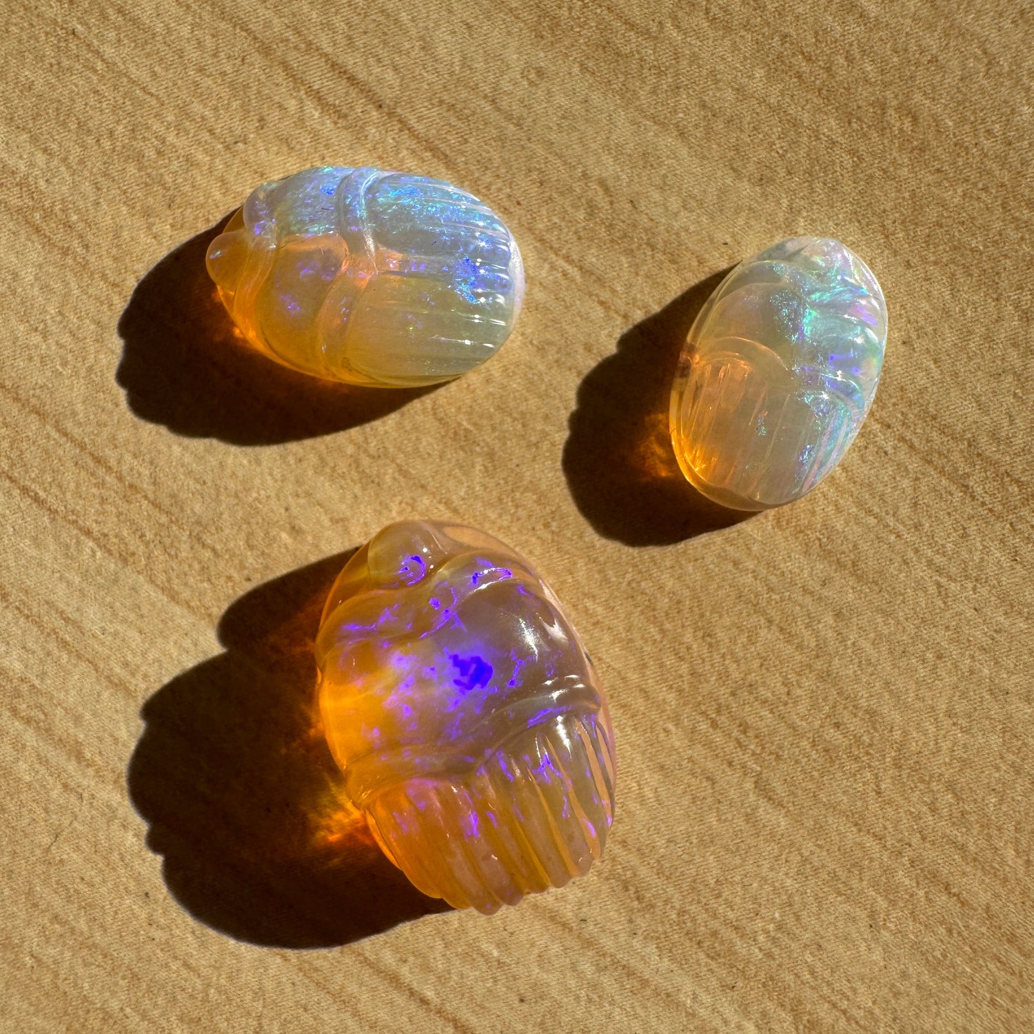 Crystal opal scarabs carvings