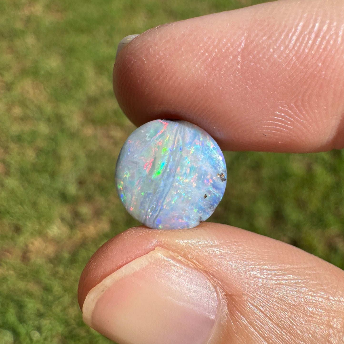 2.76 Ct small round pastel boulder opal