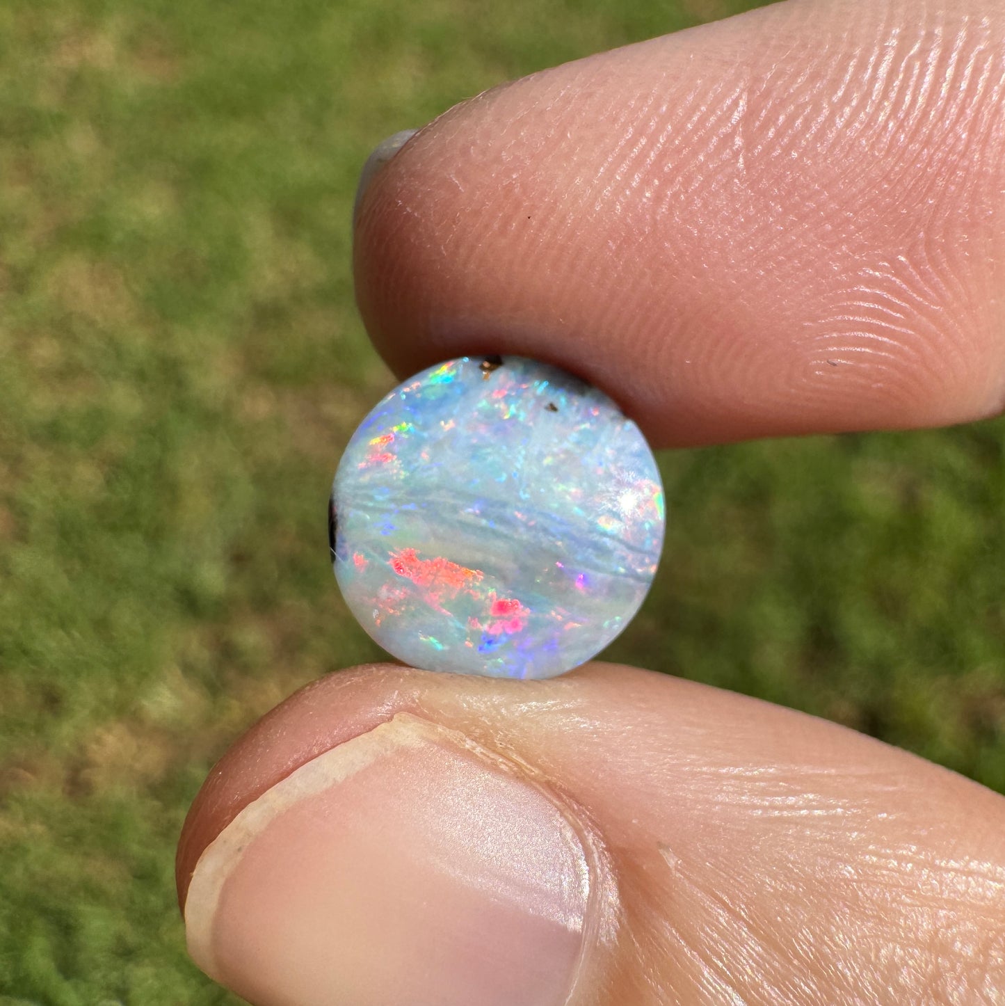 2.76 Ct small round pastel boulder opal