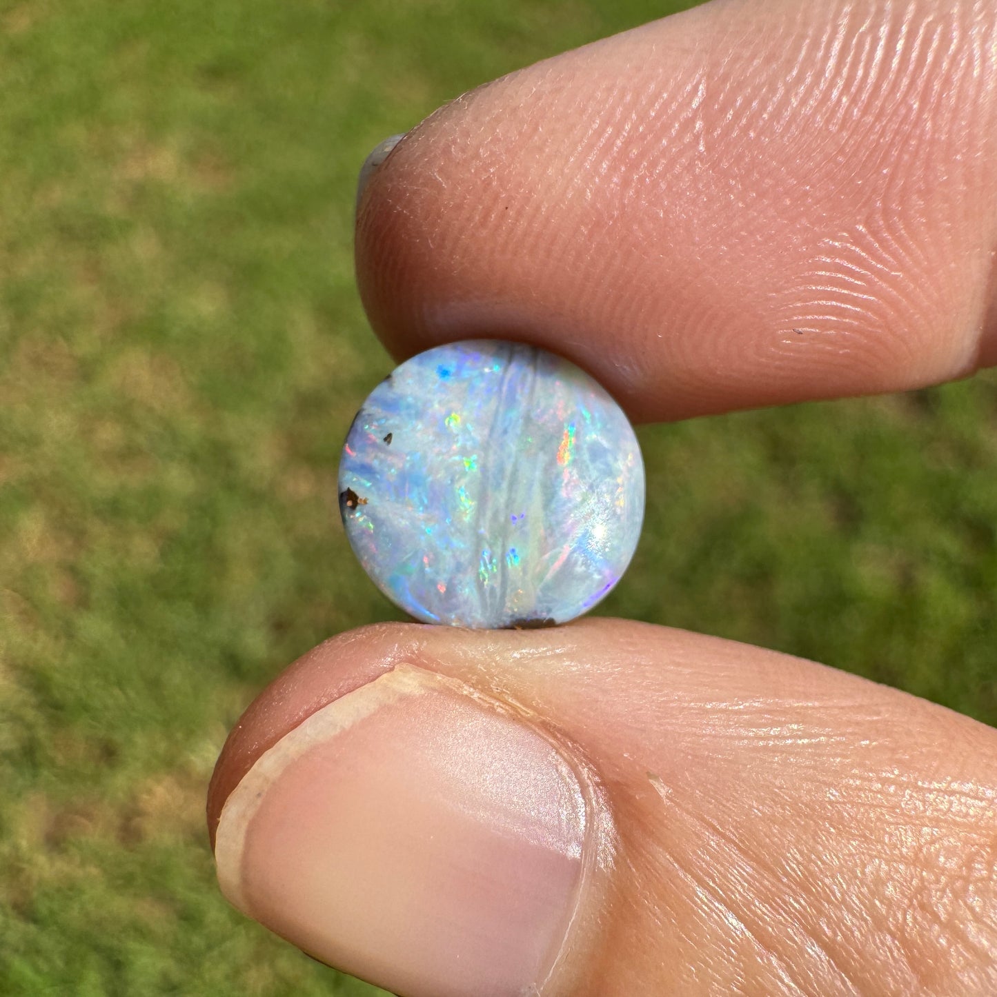 2.76 Ct small round pastel boulder opal