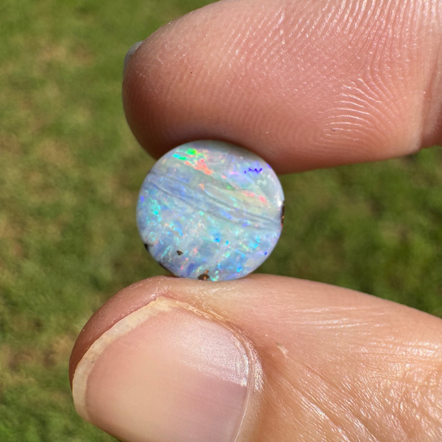 2.76 Ct small round pastel boulder opal