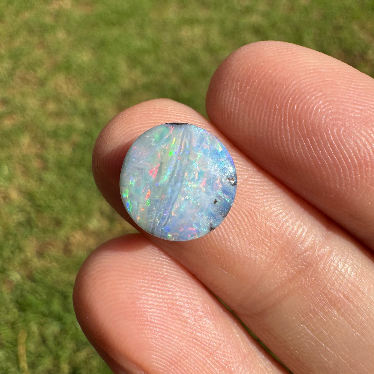 2.76 Ct small round pastel boulder opal