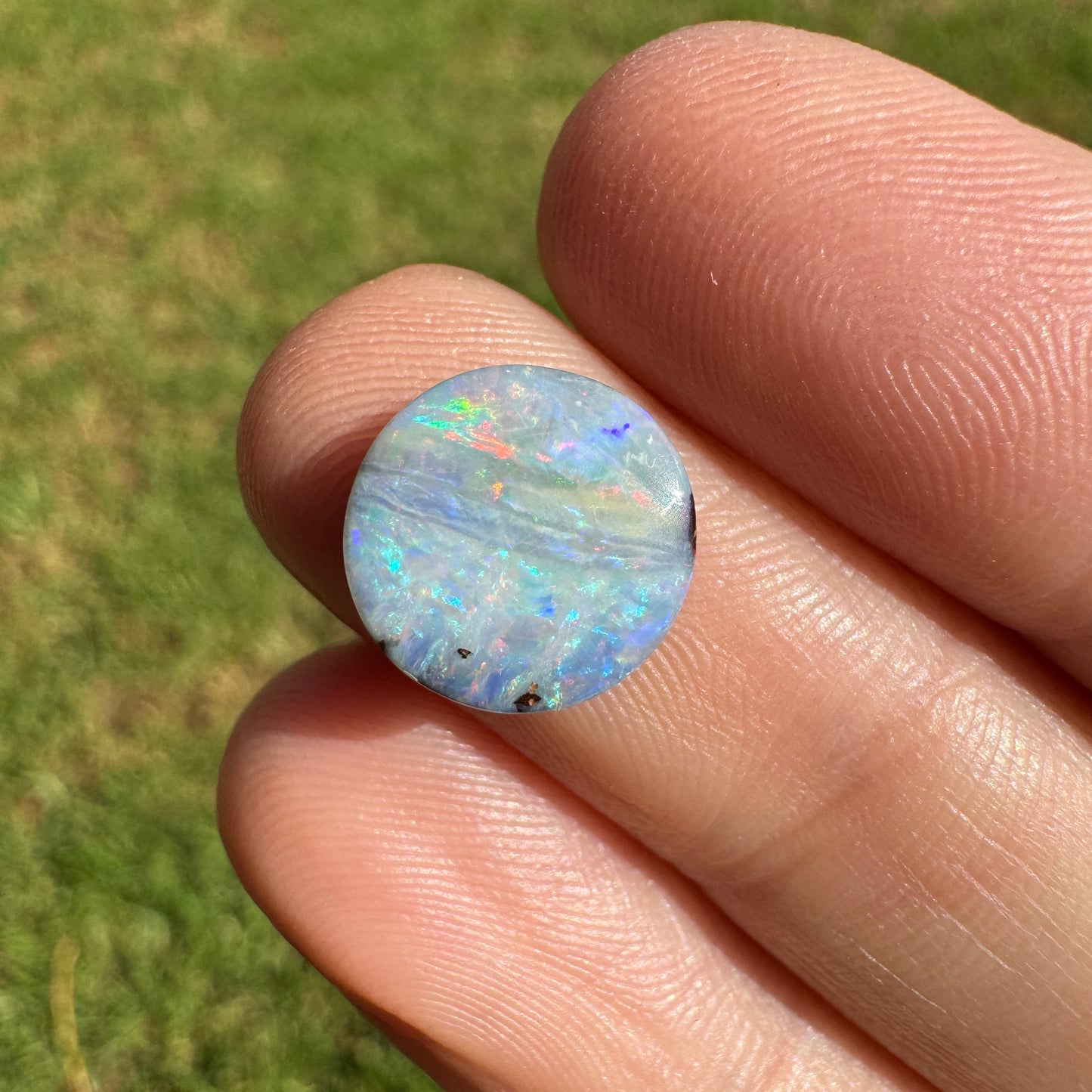 2.76 Ct small round pastel boulder opal