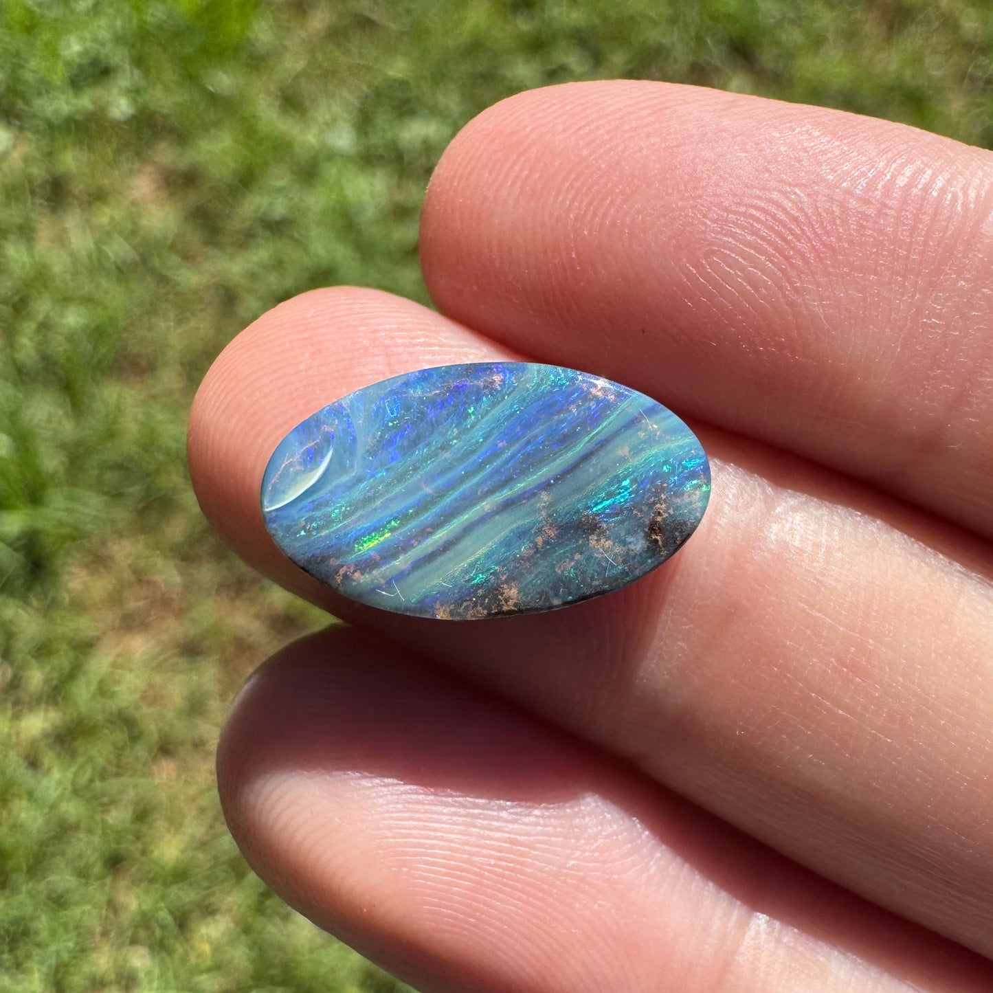 4.47 Ct striped oval boulder opal