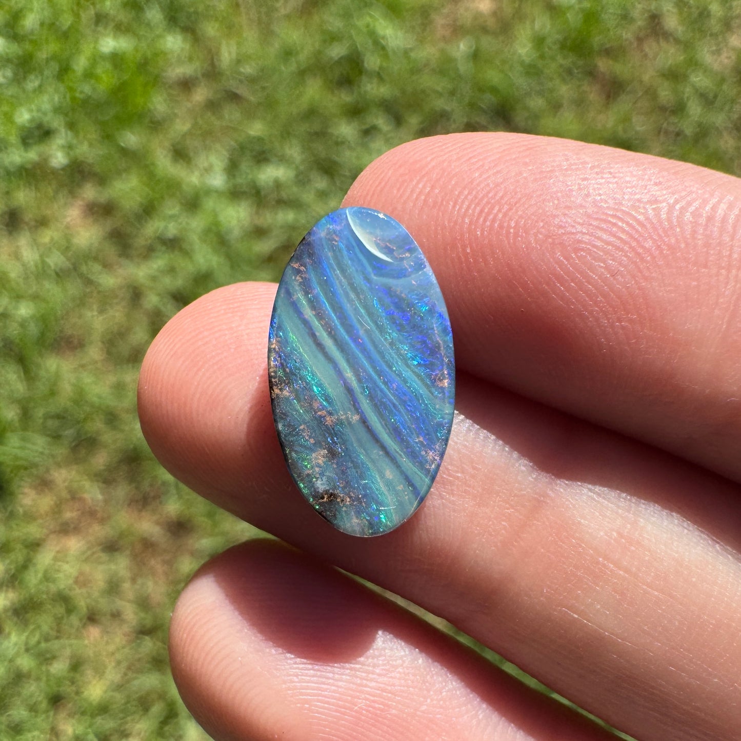 4.47 Ct striped oval boulder opal