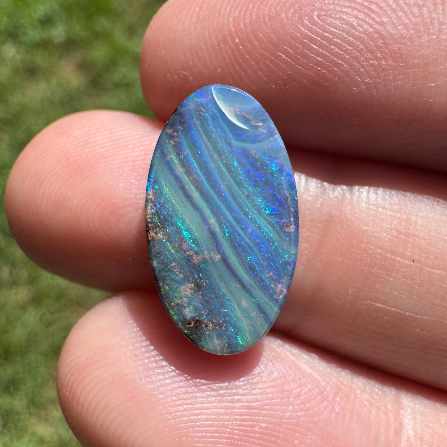 4.47 Ct striped oval boulder opal