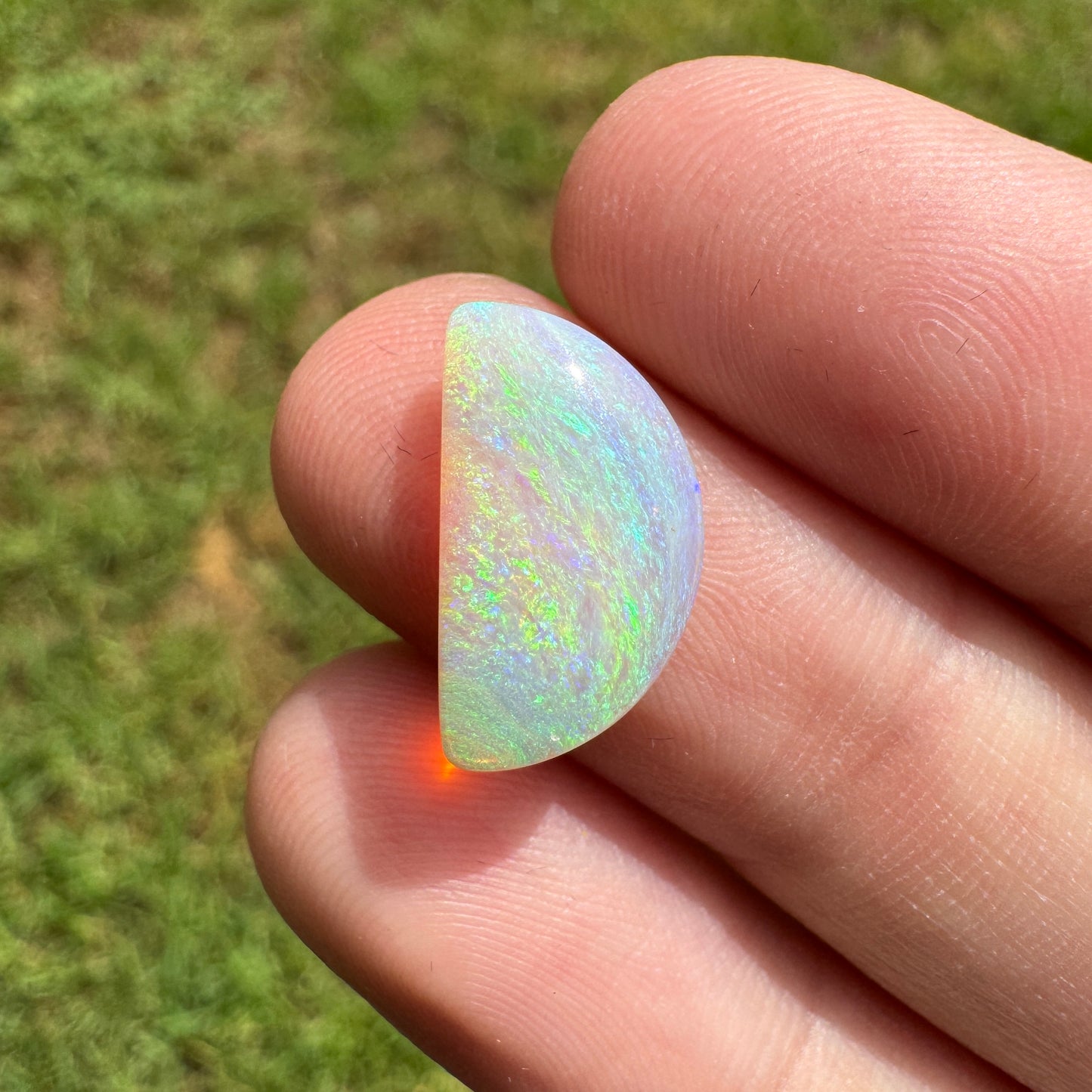 2.78 Ct half-circle crystal opal