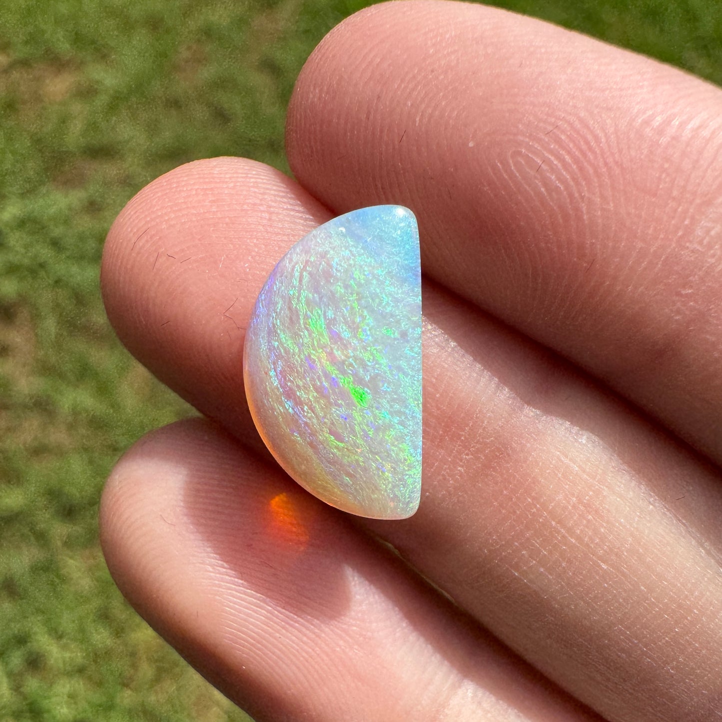 2.78 Ct half-circle crystal opal