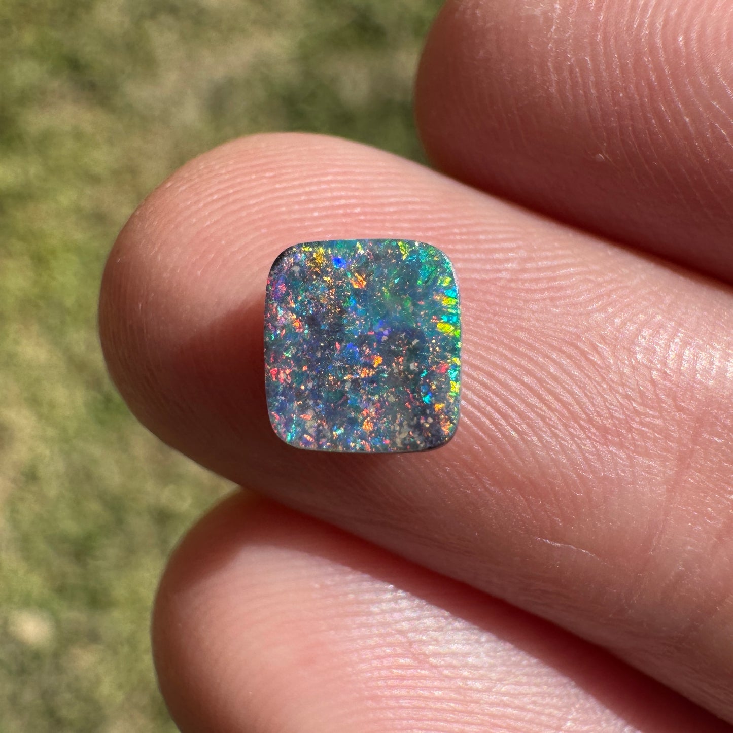 1.05 Ct small rainbow boulder opal