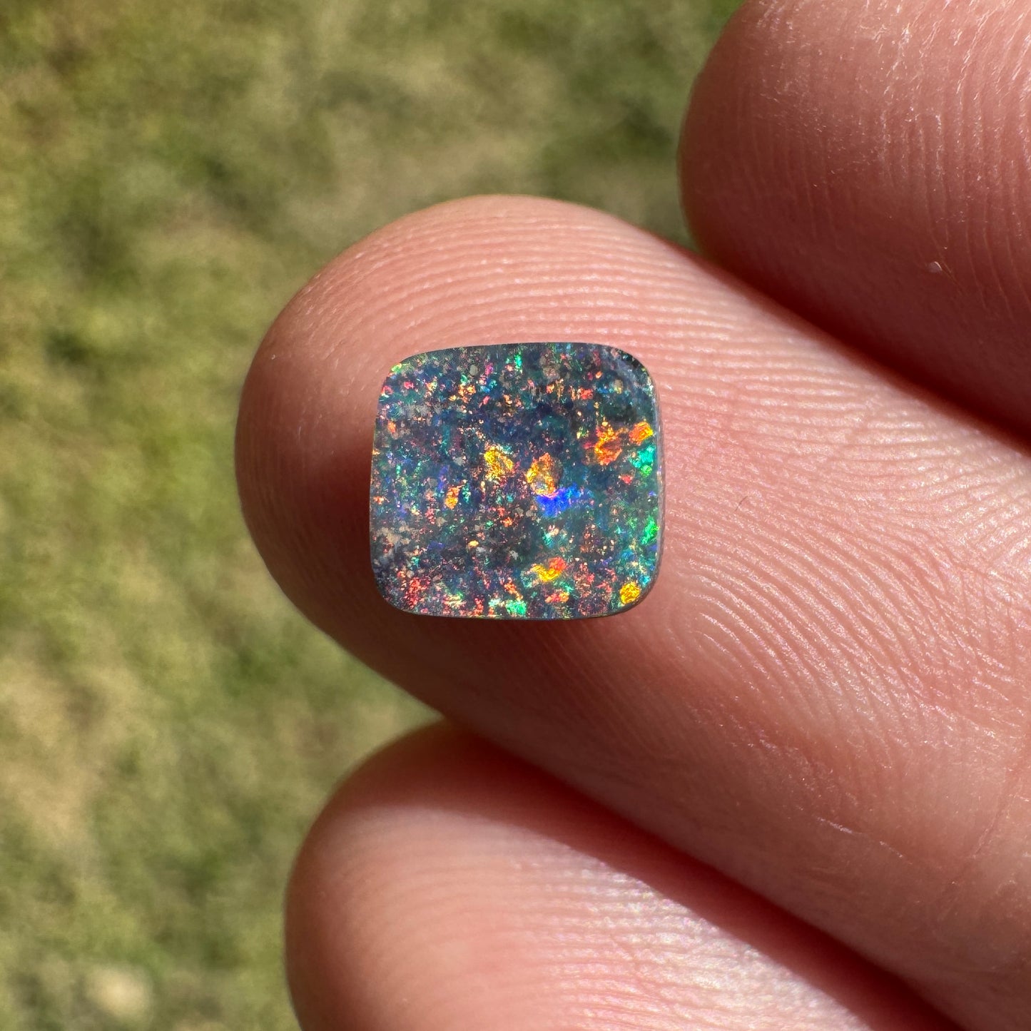 1.05 Ct small rainbow boulder opal