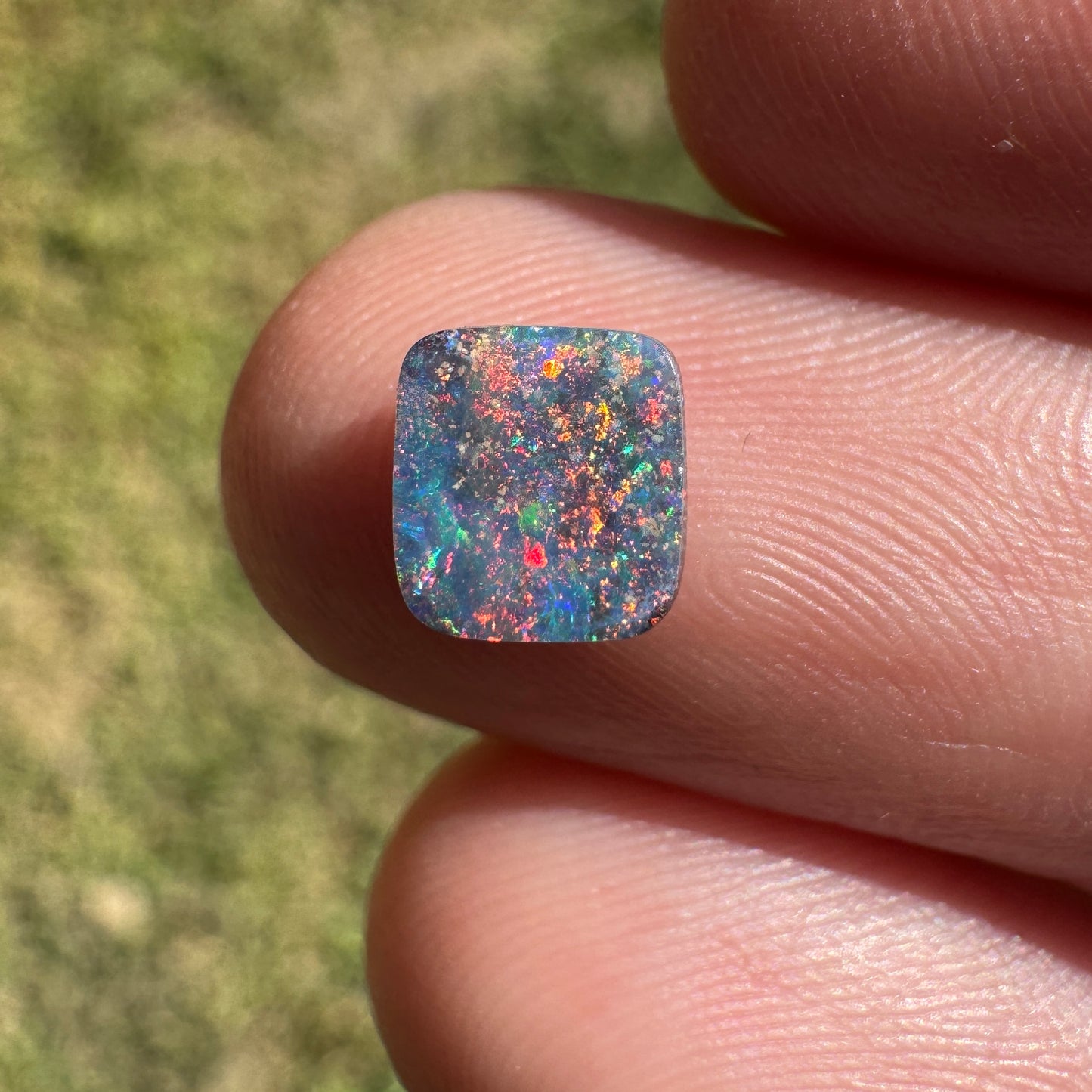 1.05 Ct small rainbow boulder opal