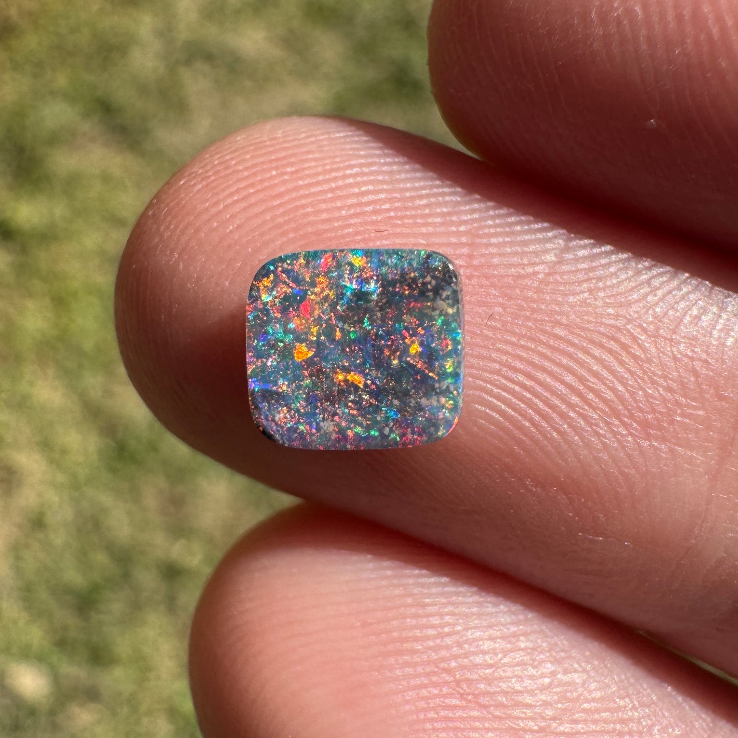1.05 Ct small rainbow boulder opal