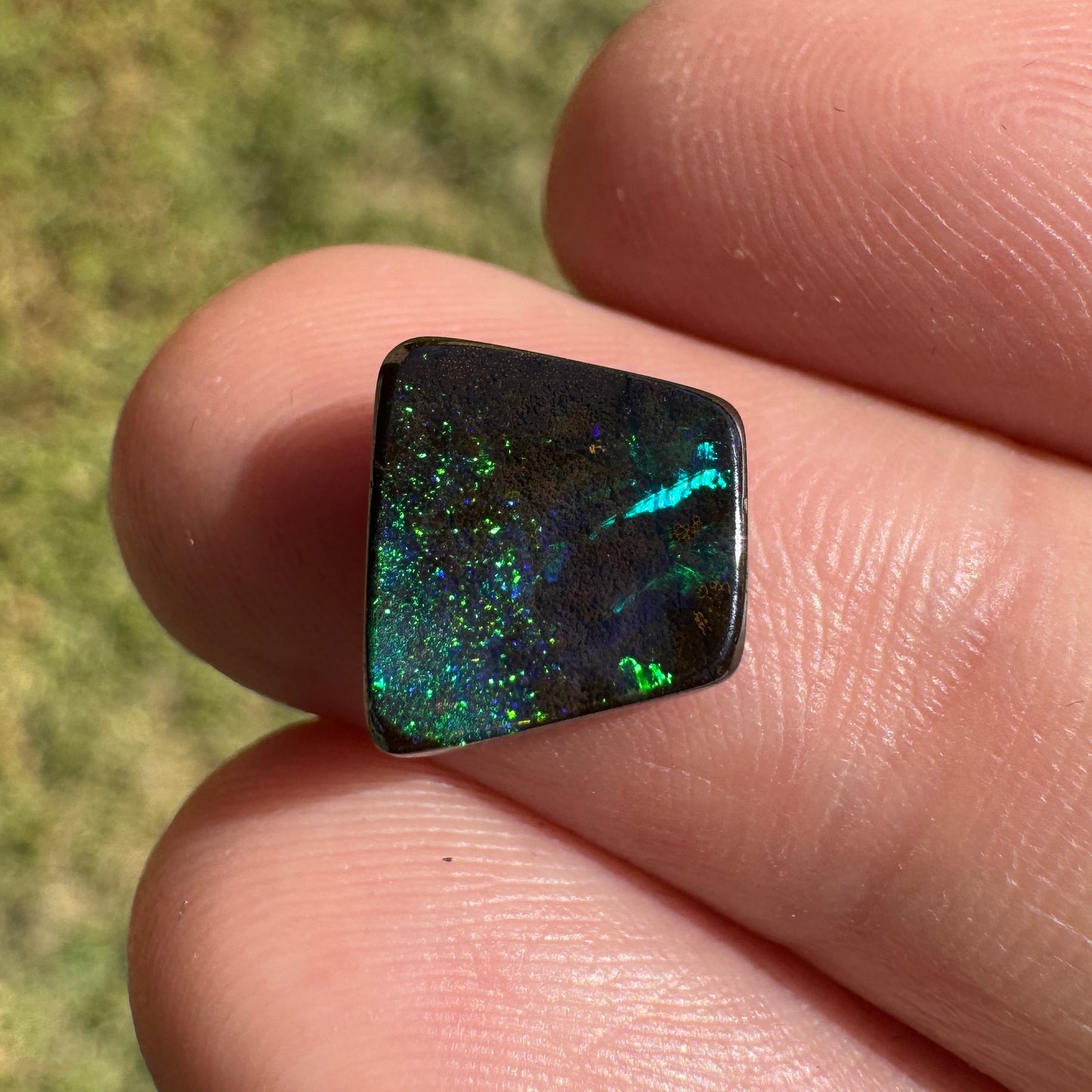 2.53 Ct small trapezoid black boulder opal
