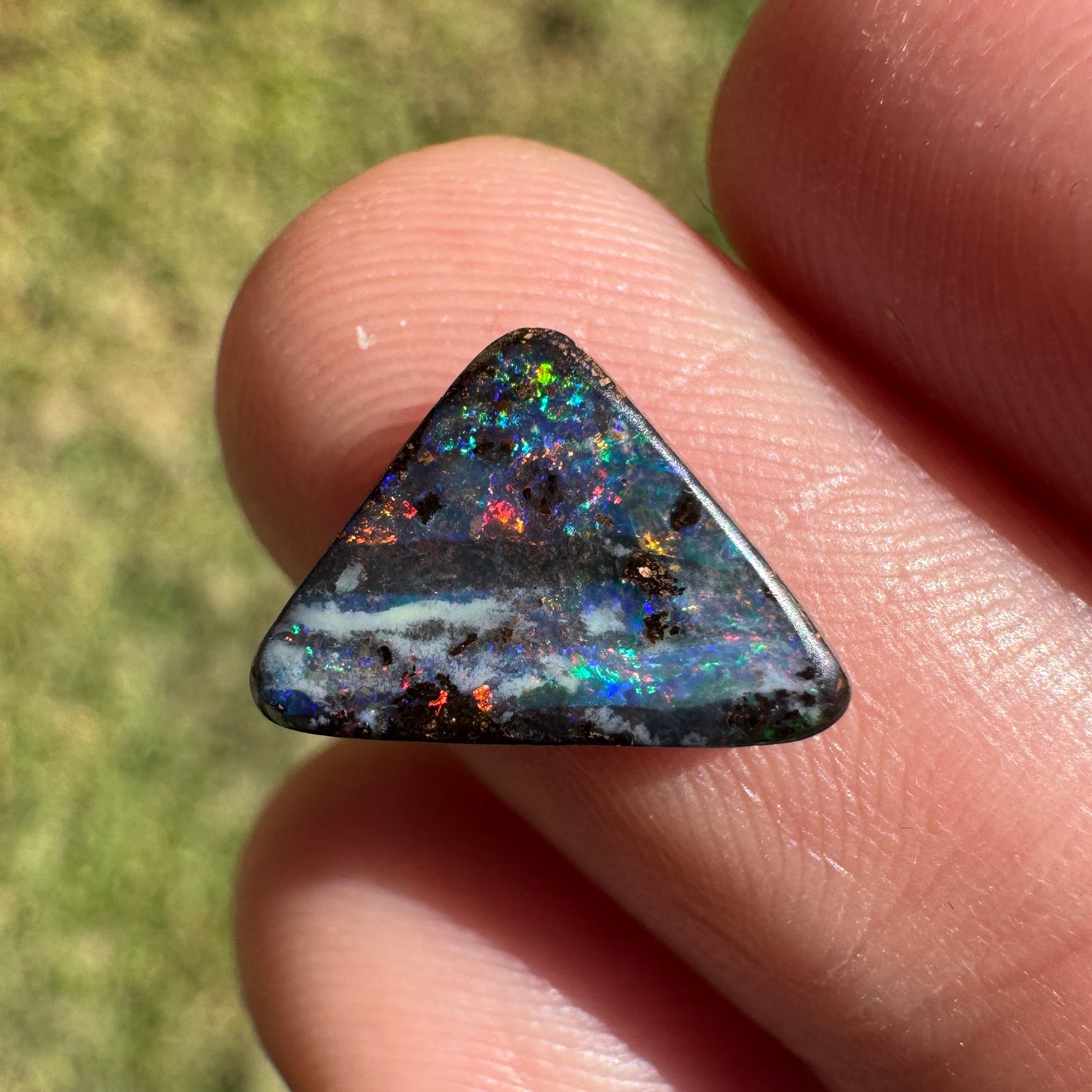 1.92 Ct small triangle black boulder opal