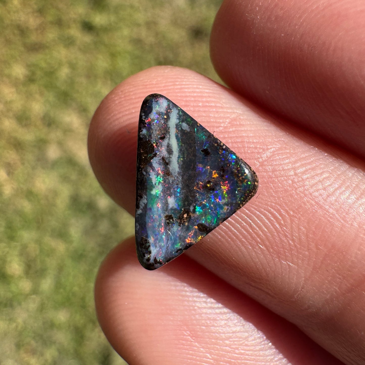 1.92 Ct small triangle black boulder opal