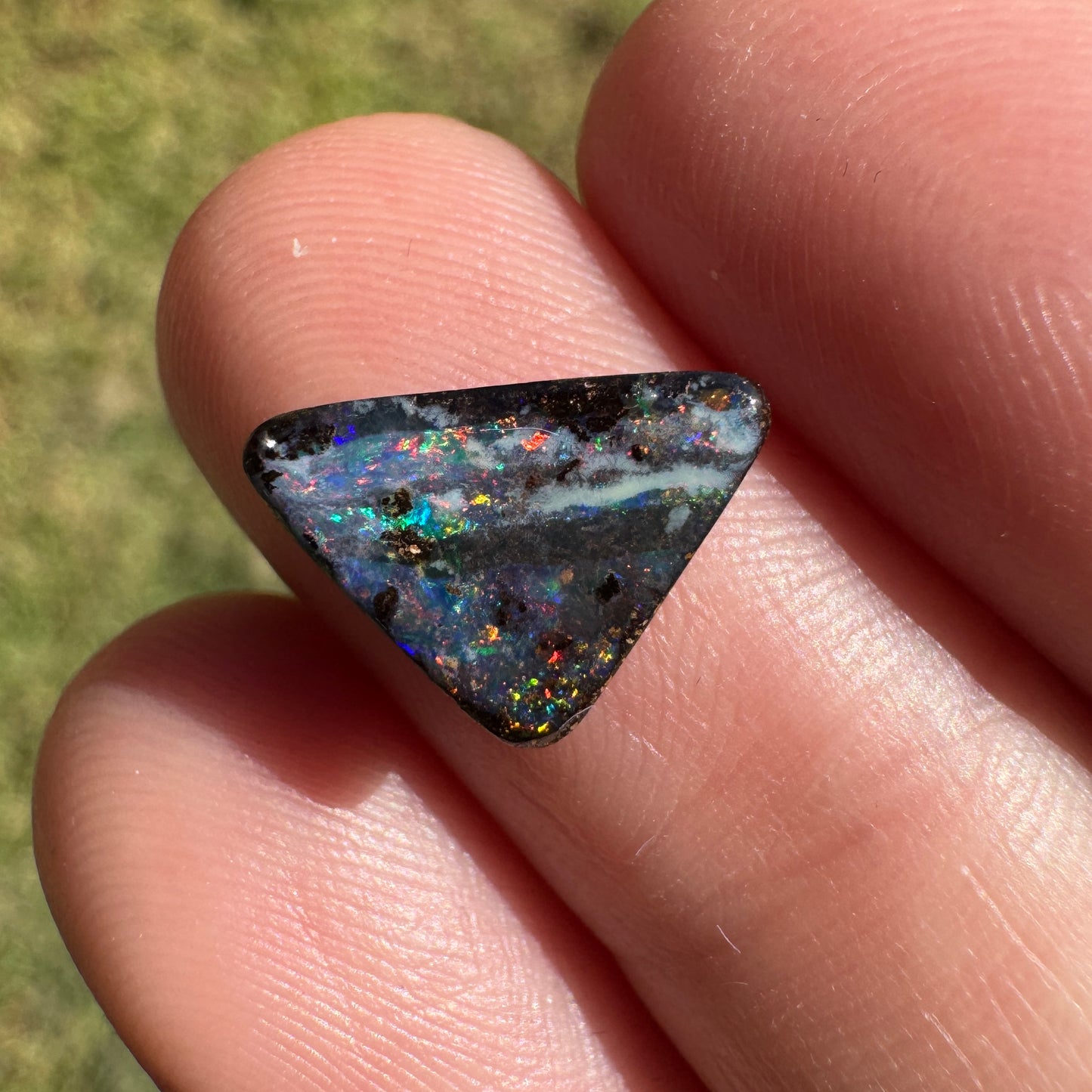 1.92 Ct small triangle black boulder opal