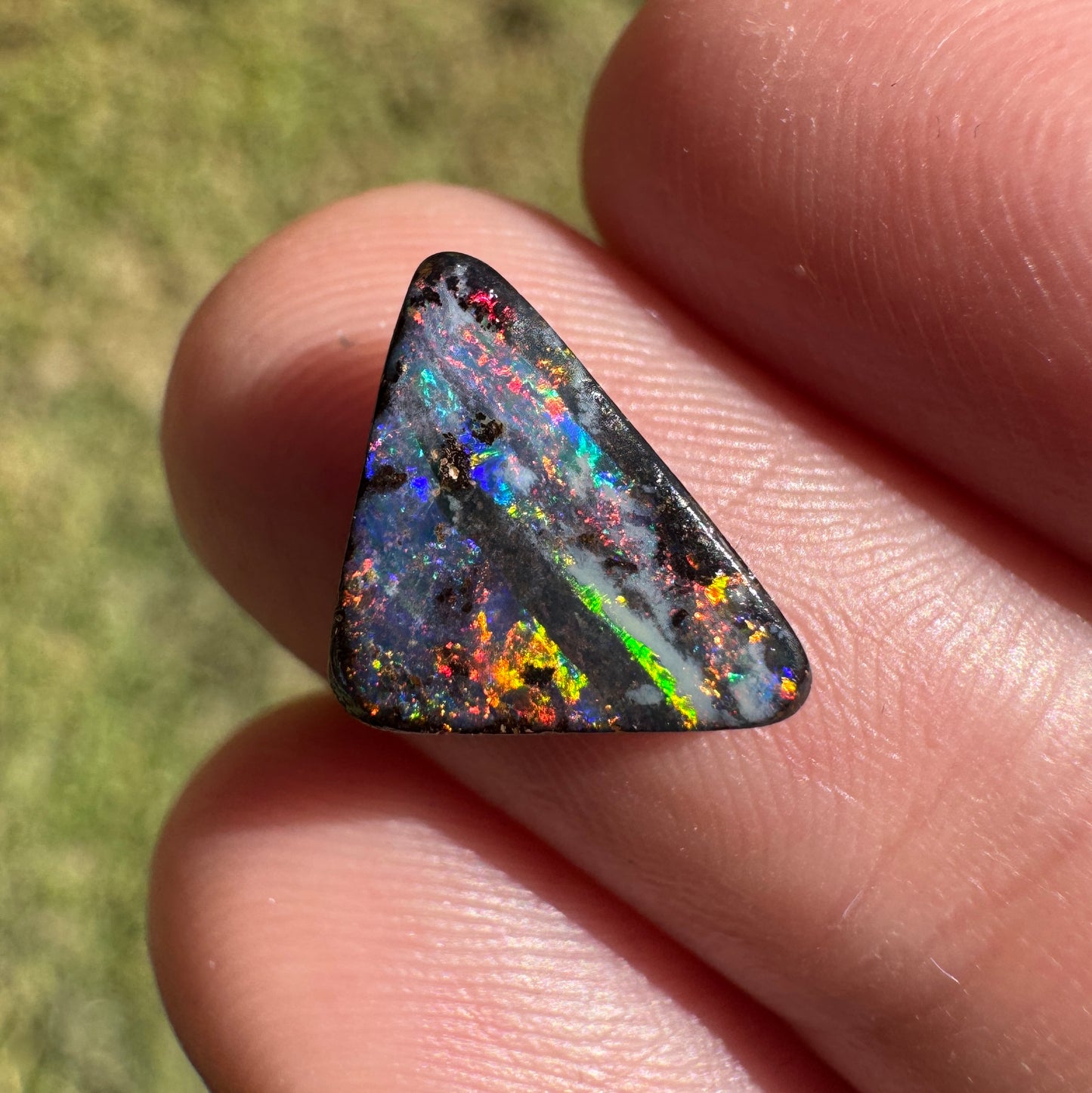 1.92 Ct small triangle black boulder opal