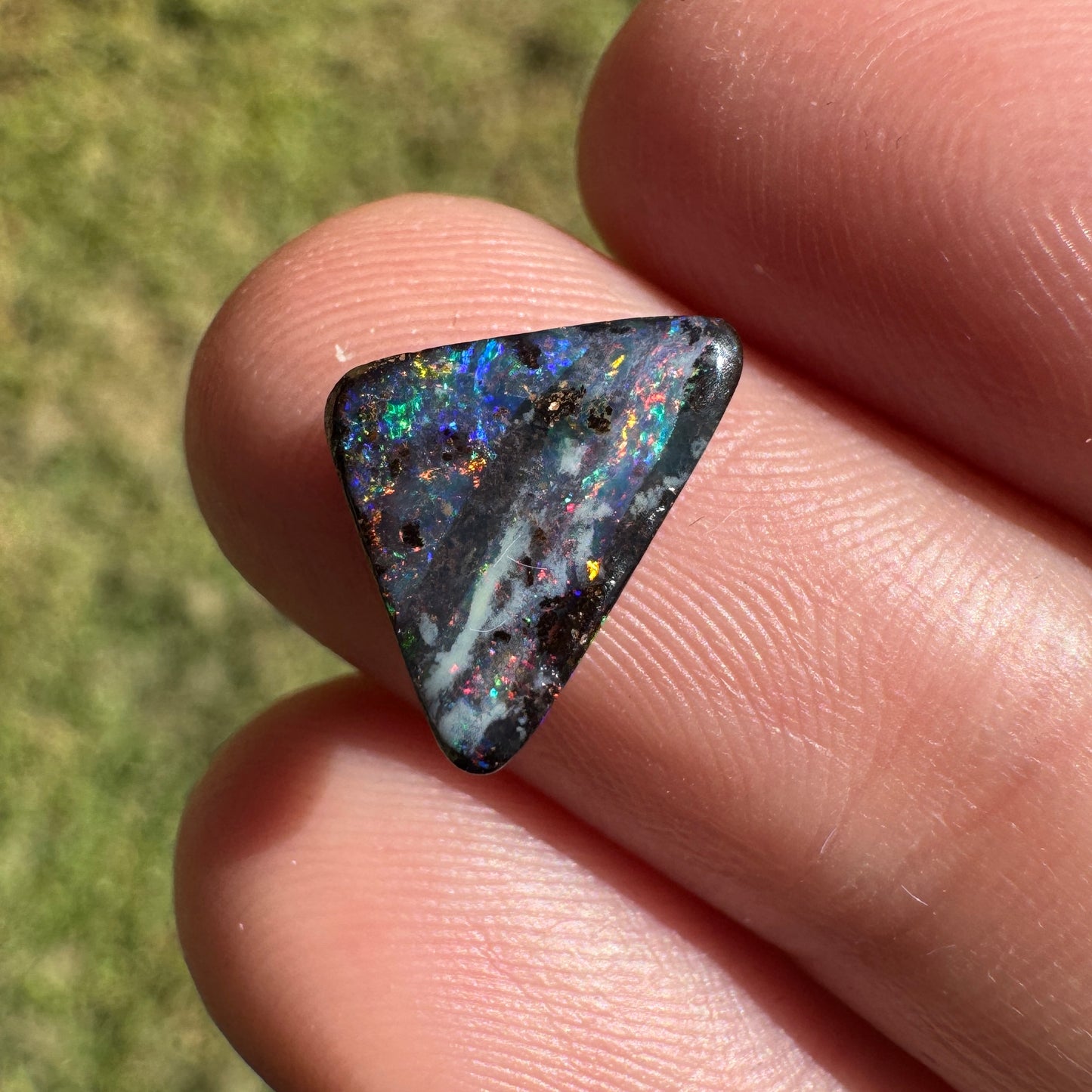 1.92 Ct small triangle black boulder opal