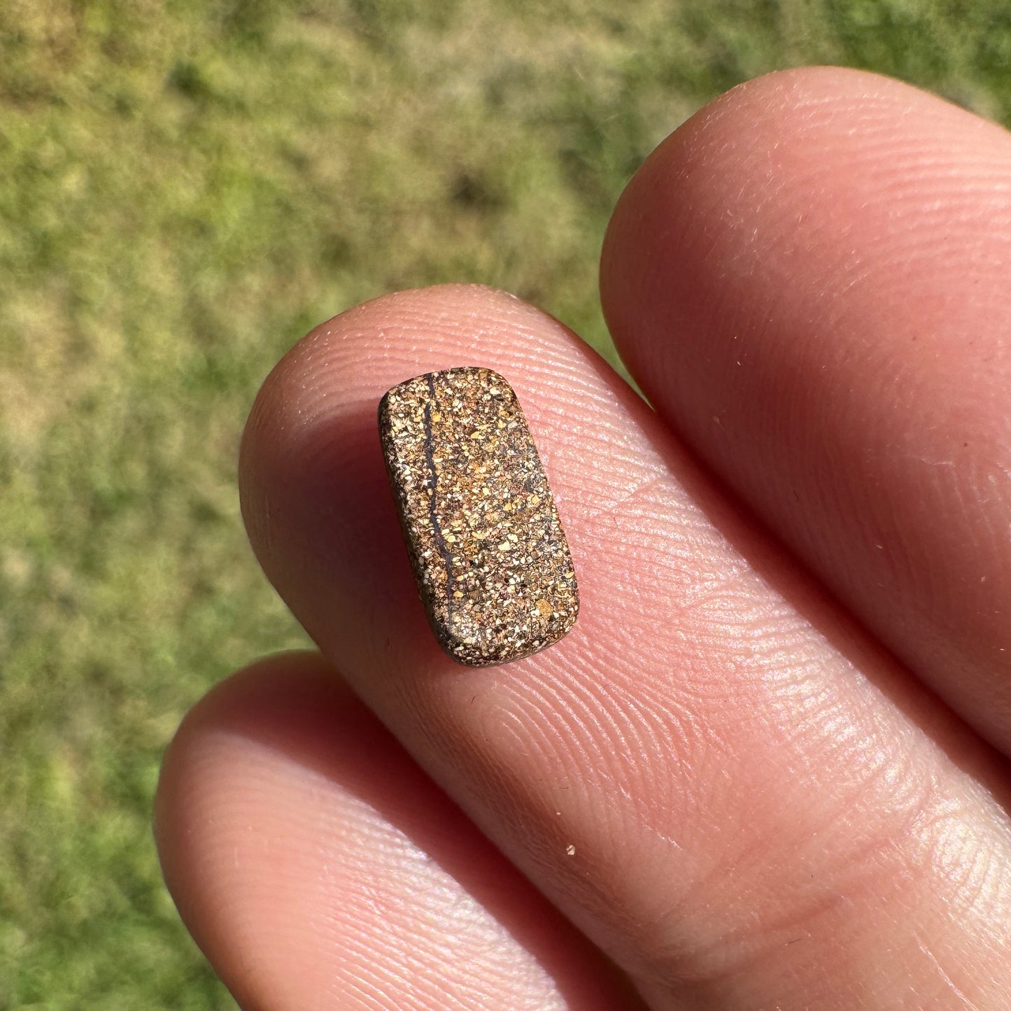 0.55 Ct extra small red and pink boulder opal