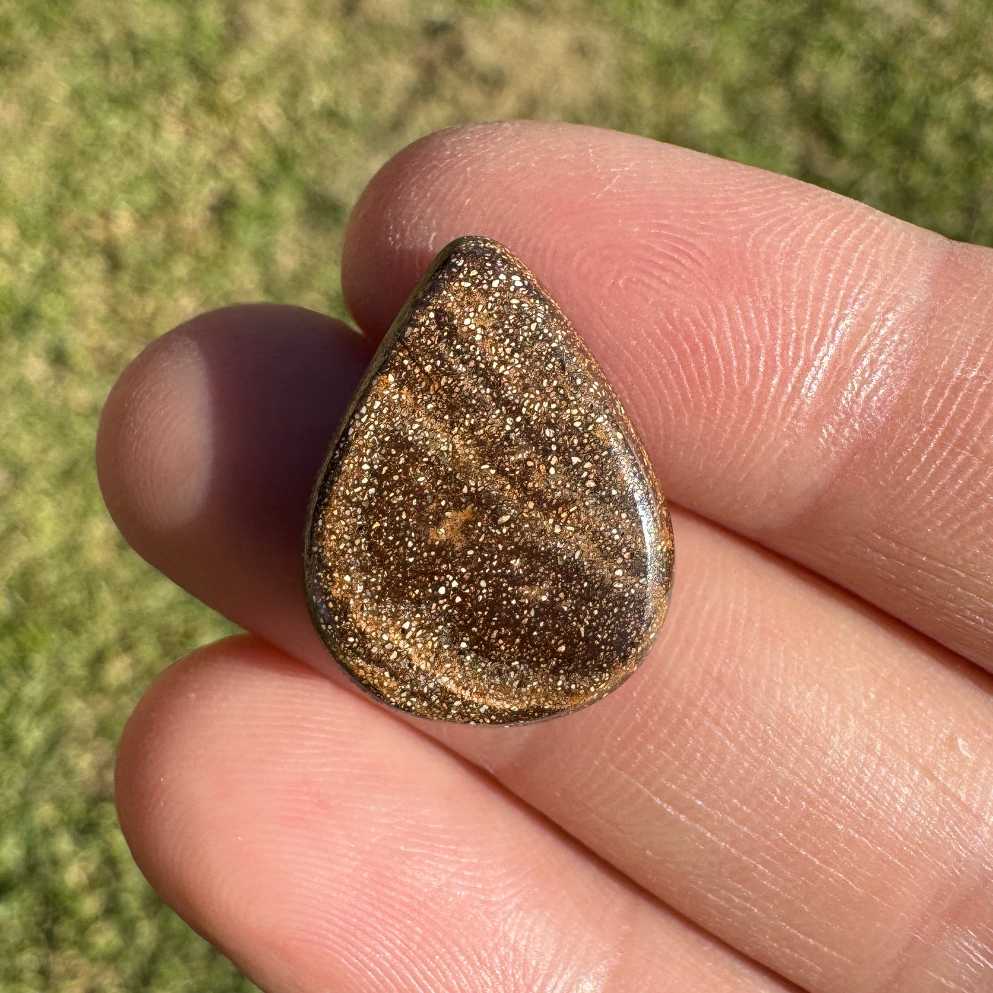 9.37 Ct swirly blue teardrop boulder opal