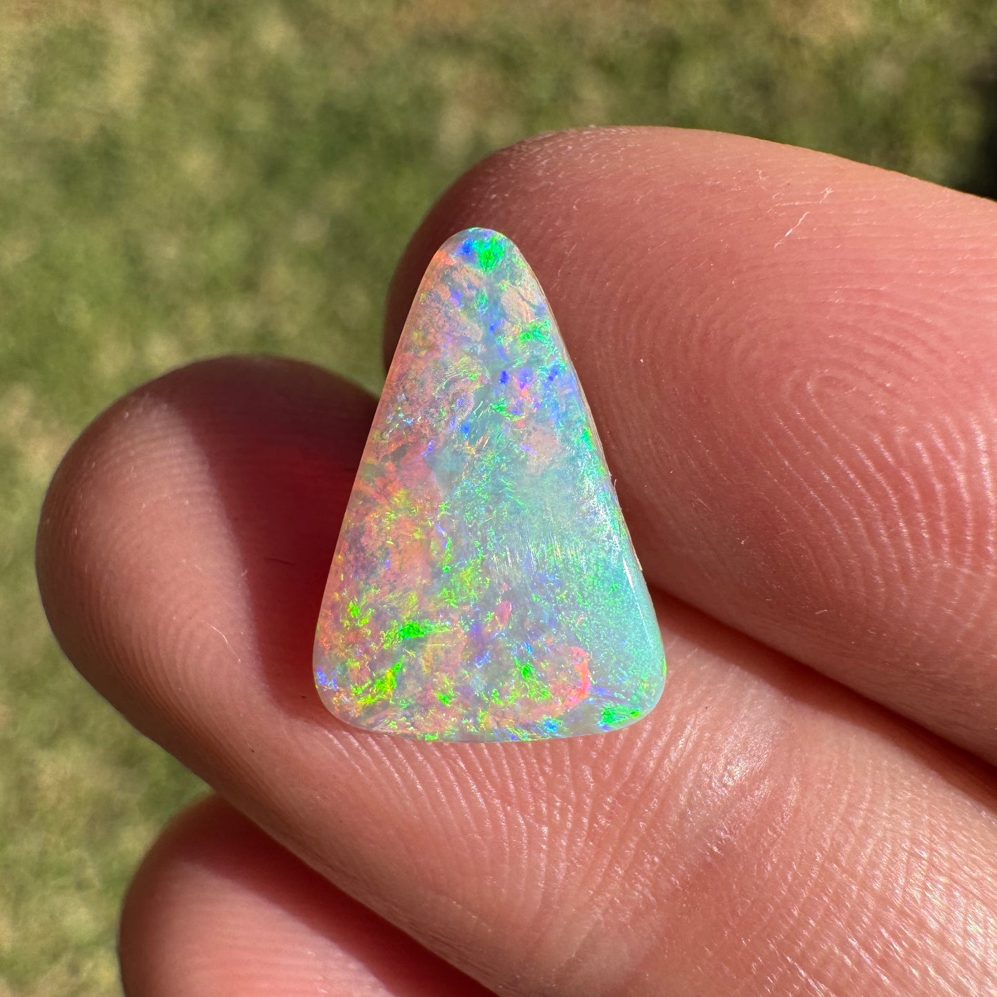 2.06 Ct bright green crystal boulder opal