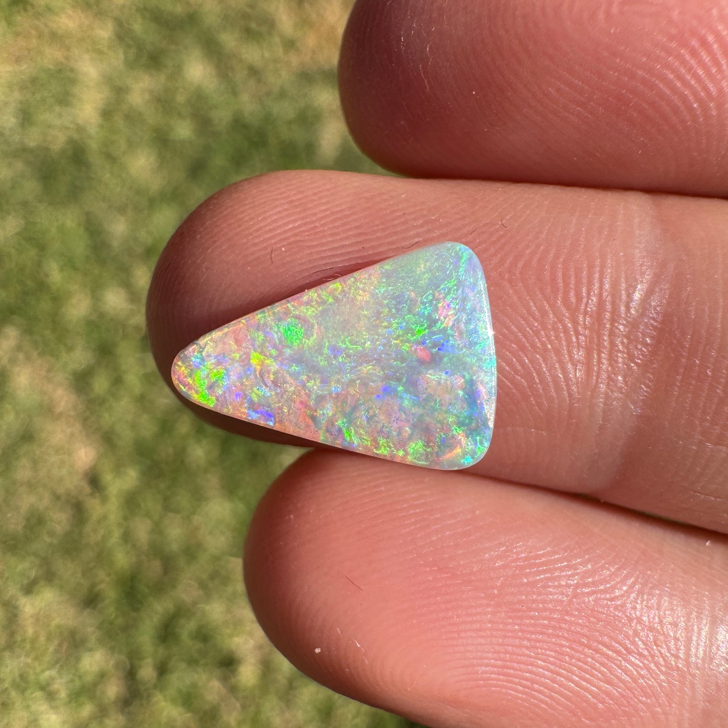 2.06 Ct bright green crystal boulder opal