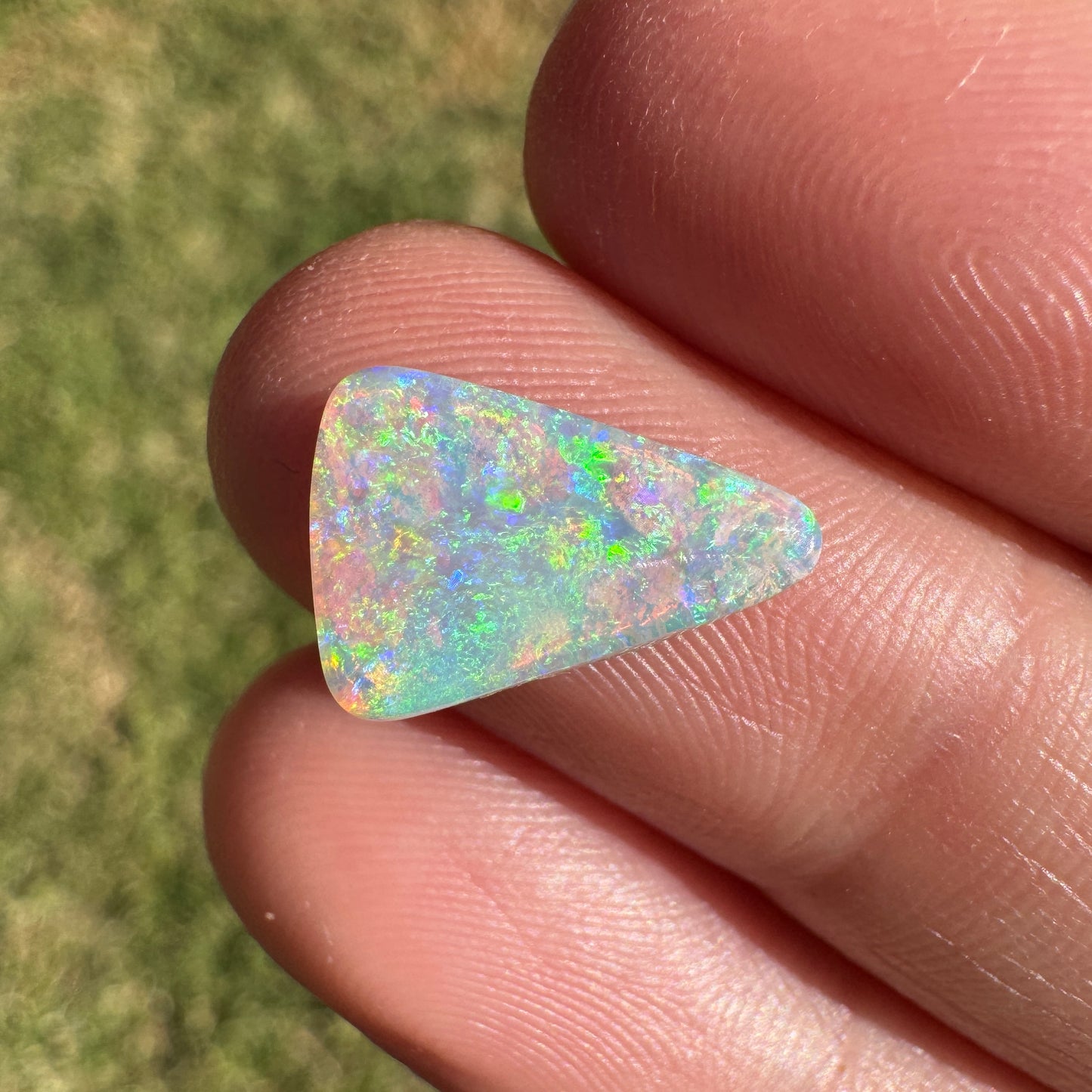 2.06 Ct bright green crystal boulder opal