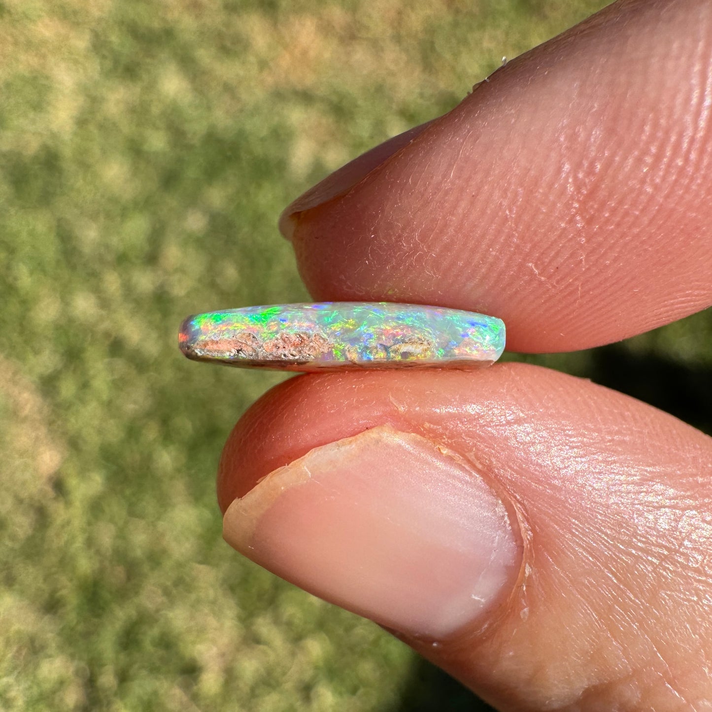 2.06 Ct bright green crystal boulder opal