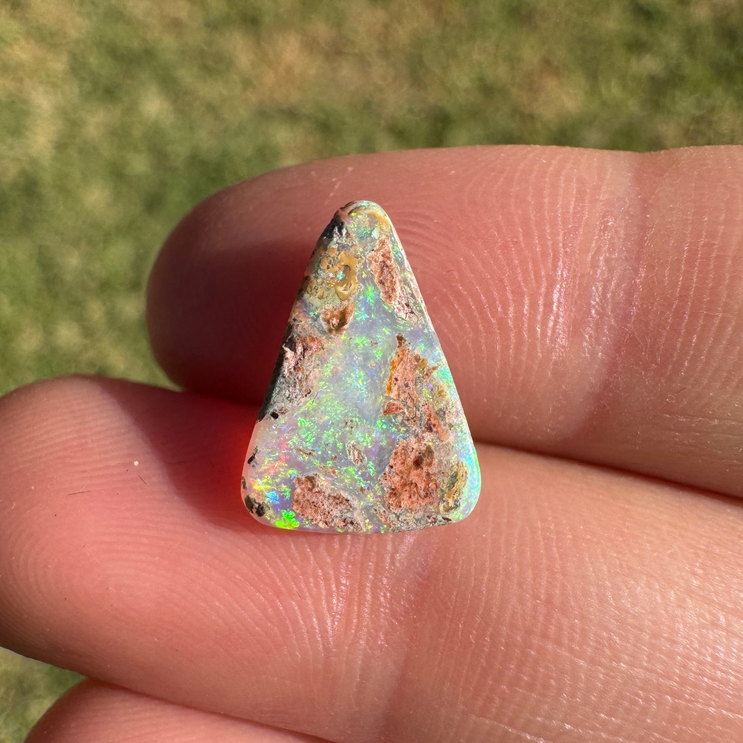 2.06 Ct bright green crystal boulder opal