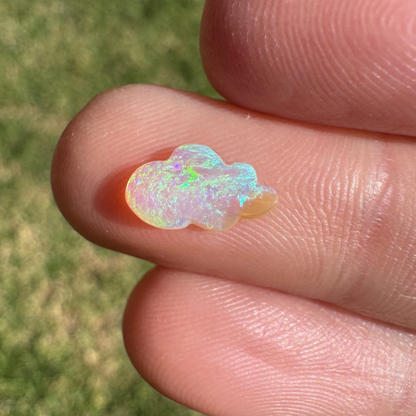 0.57 Ct extra small cloud carving crystal opal