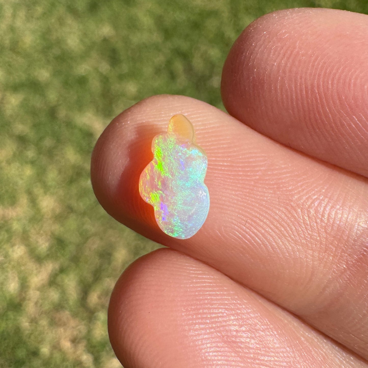 0.57 Ct extra small cloud carving crystal opal