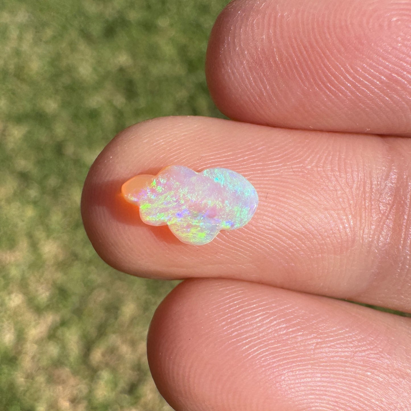0.57 Ct extra small cloud carving crystal opal