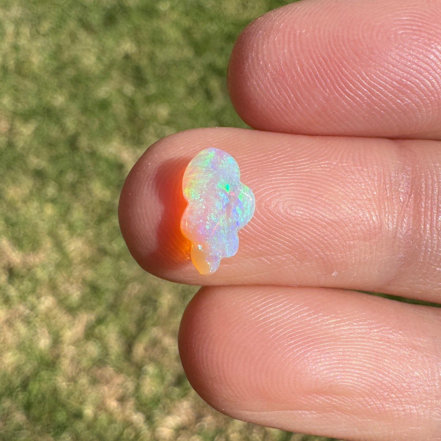 0.57 Ct extra small cloud carving crystal opal