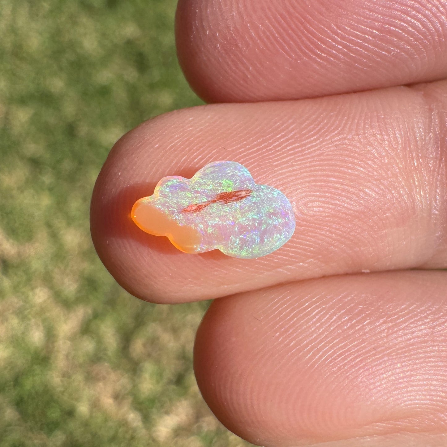 0.57 Ct extra small cloud carving crystal opal