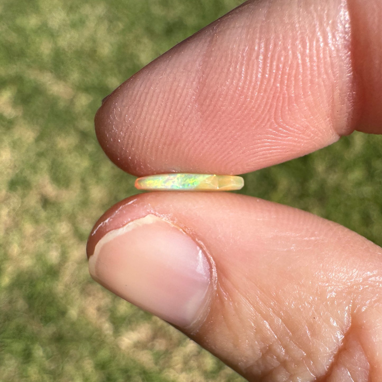 0.57 Ct extra small cloud carving crystal opal