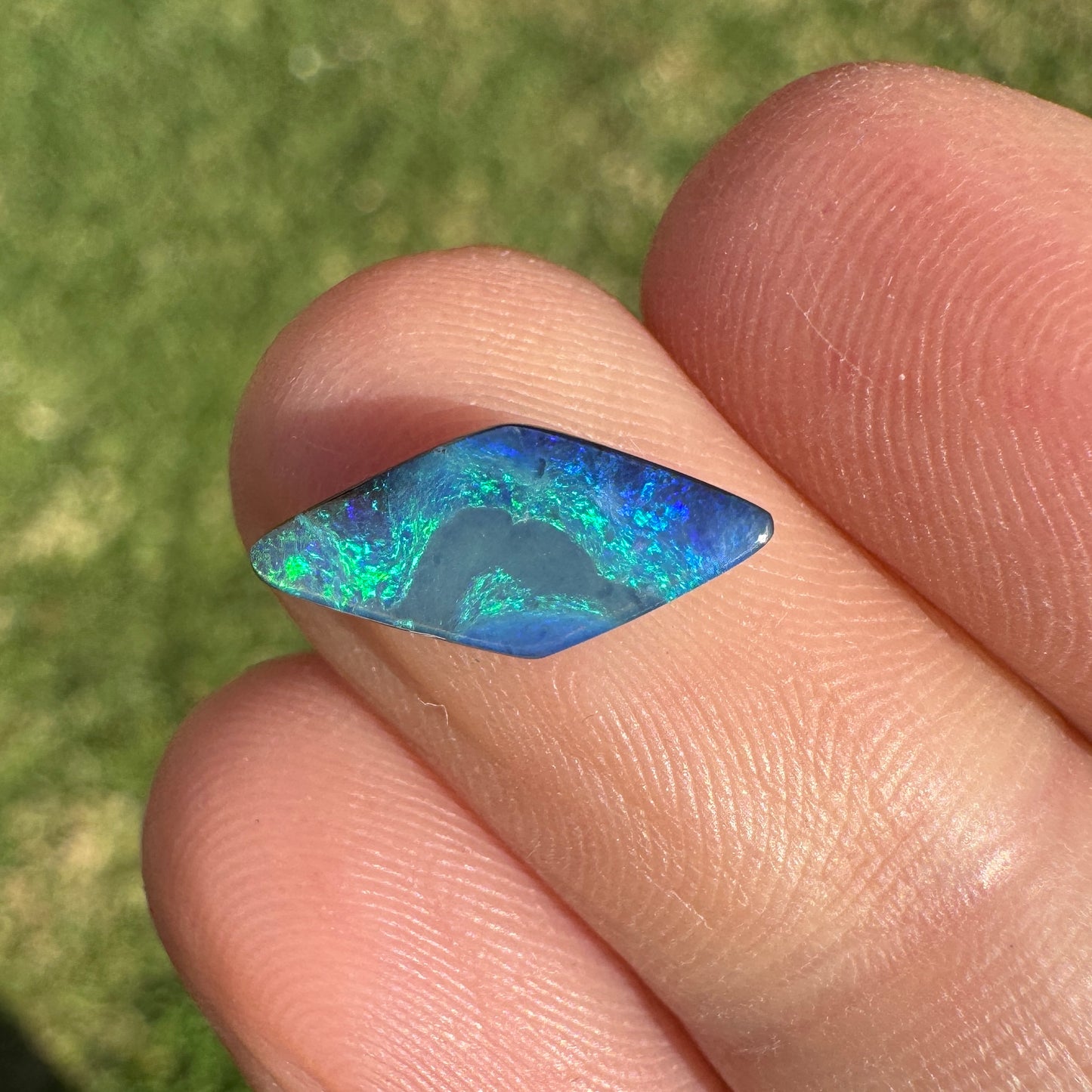 1.54 Ct small green-blue boulder opal