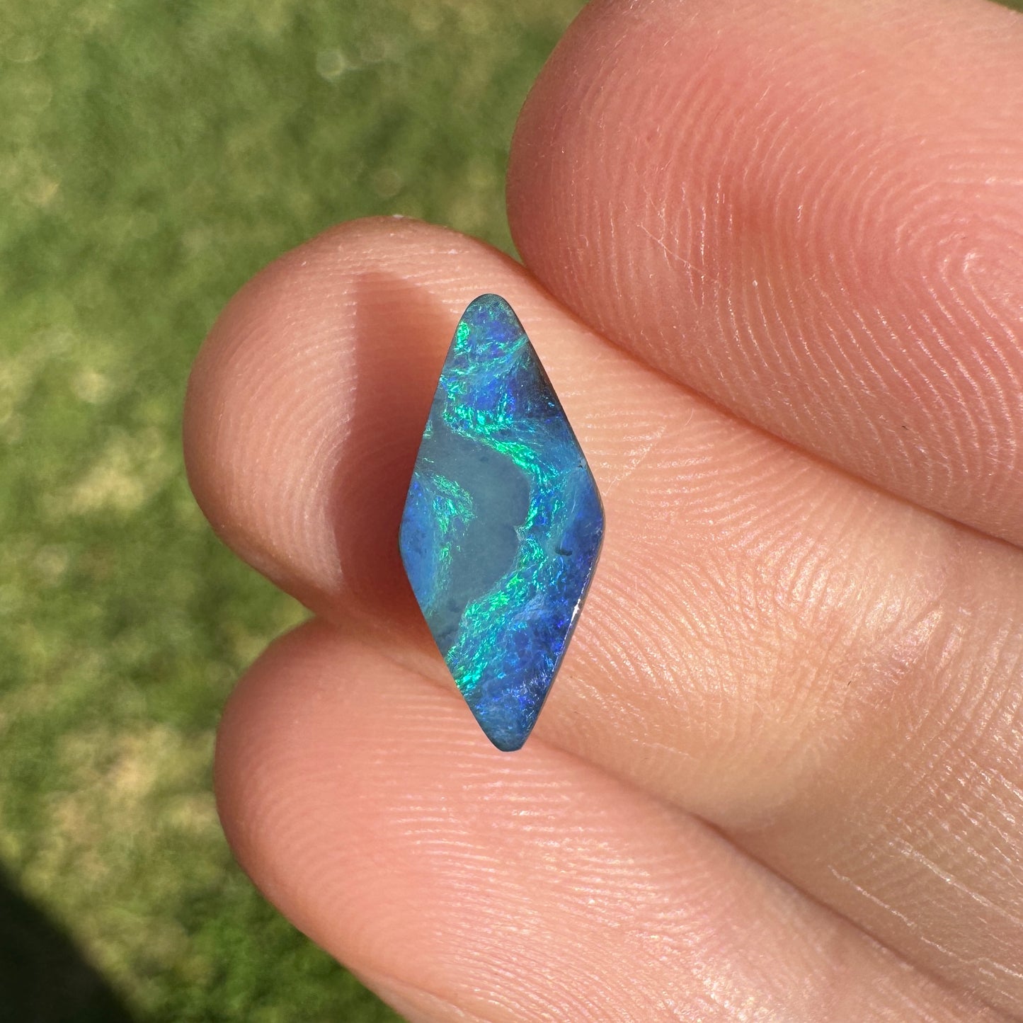 1.54 Ct small green-blue boulder opal