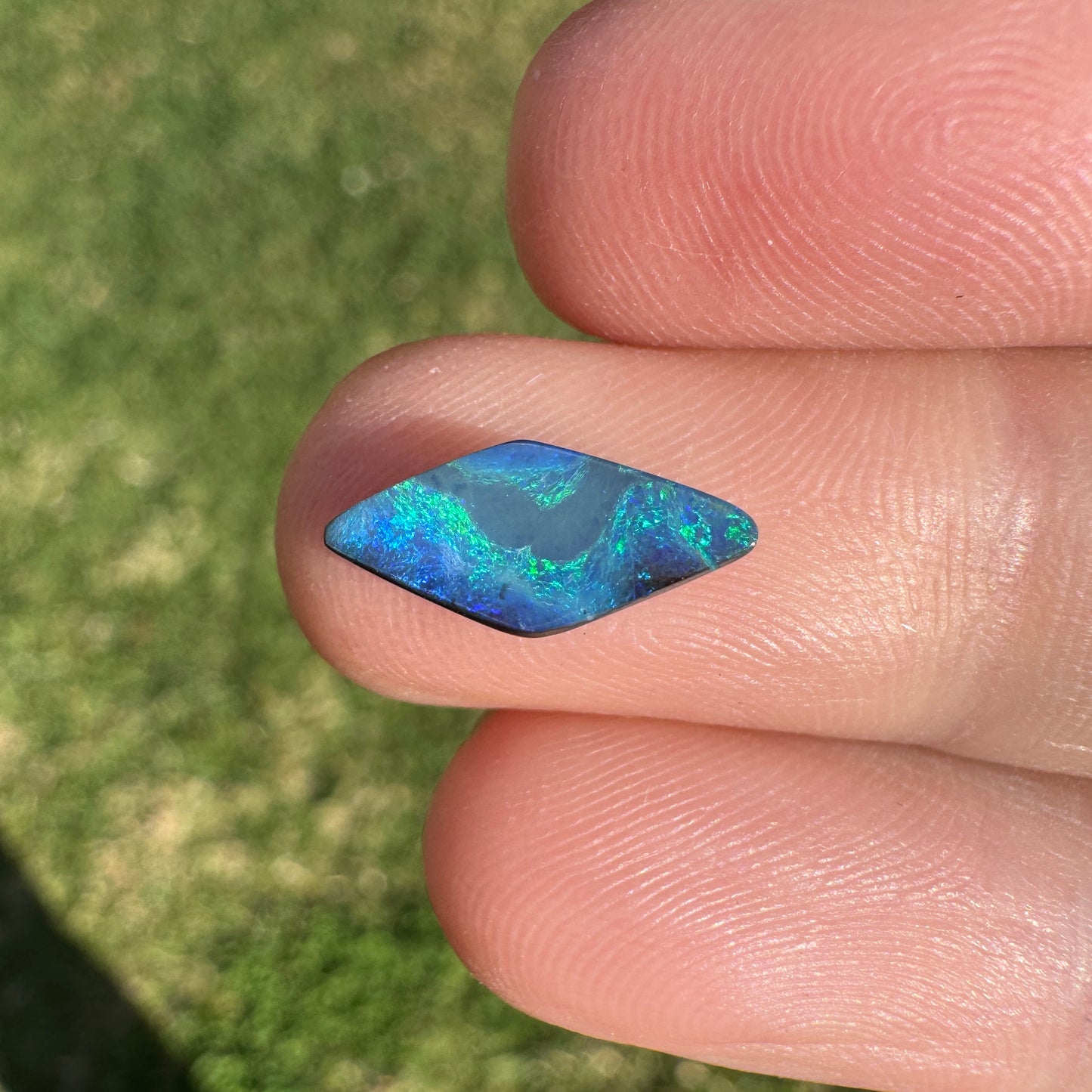 1.54 Ct small green-blue boulder opal