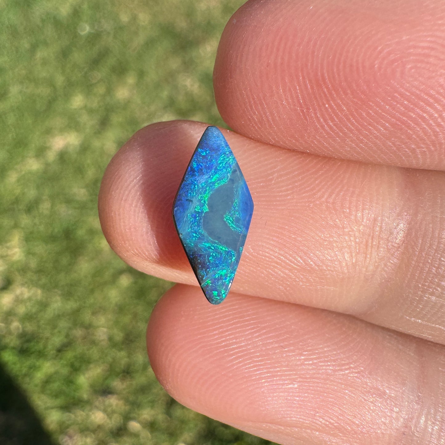 1.54 Ct small green-blue boulder opal