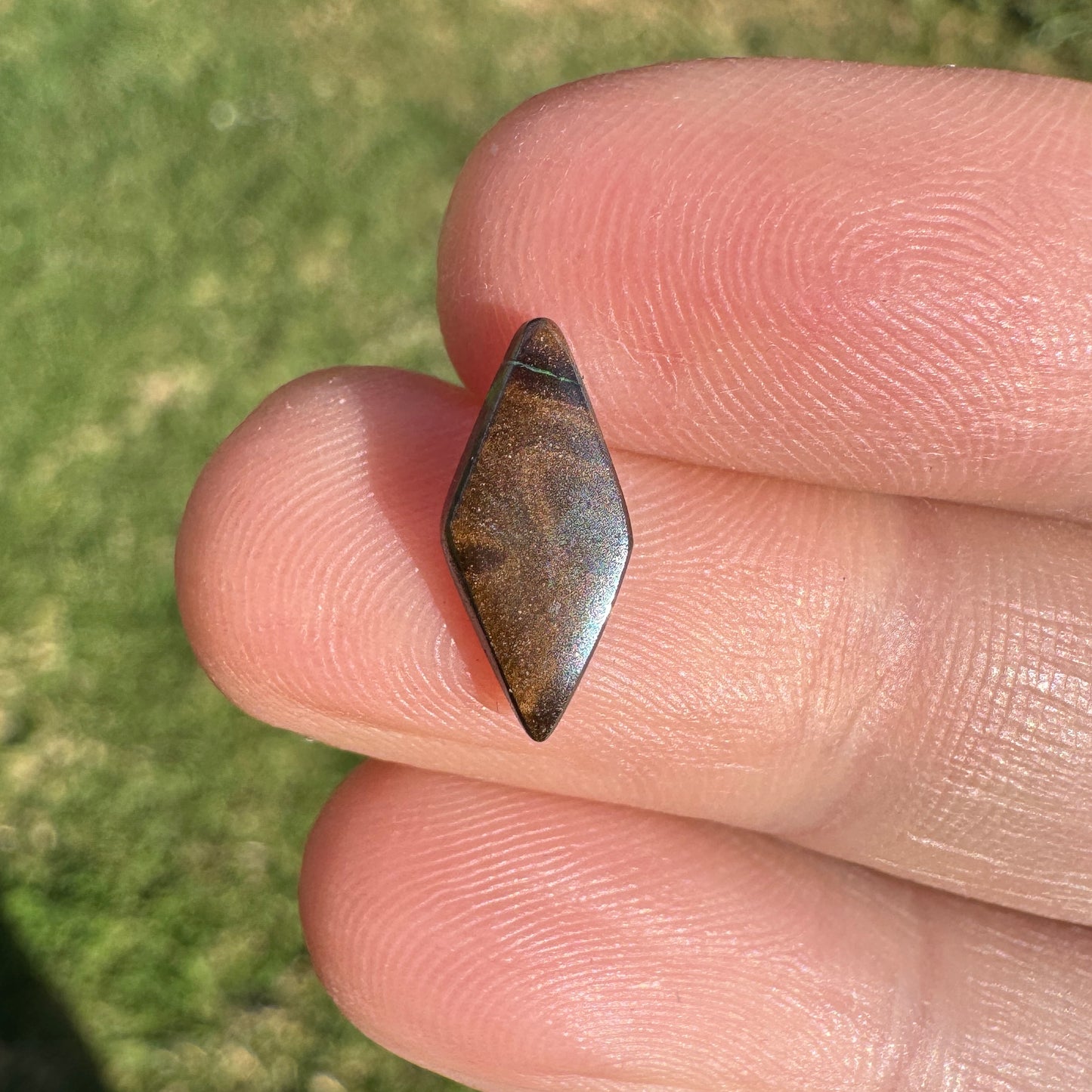 1.54 Ct small green-blue boulder opal