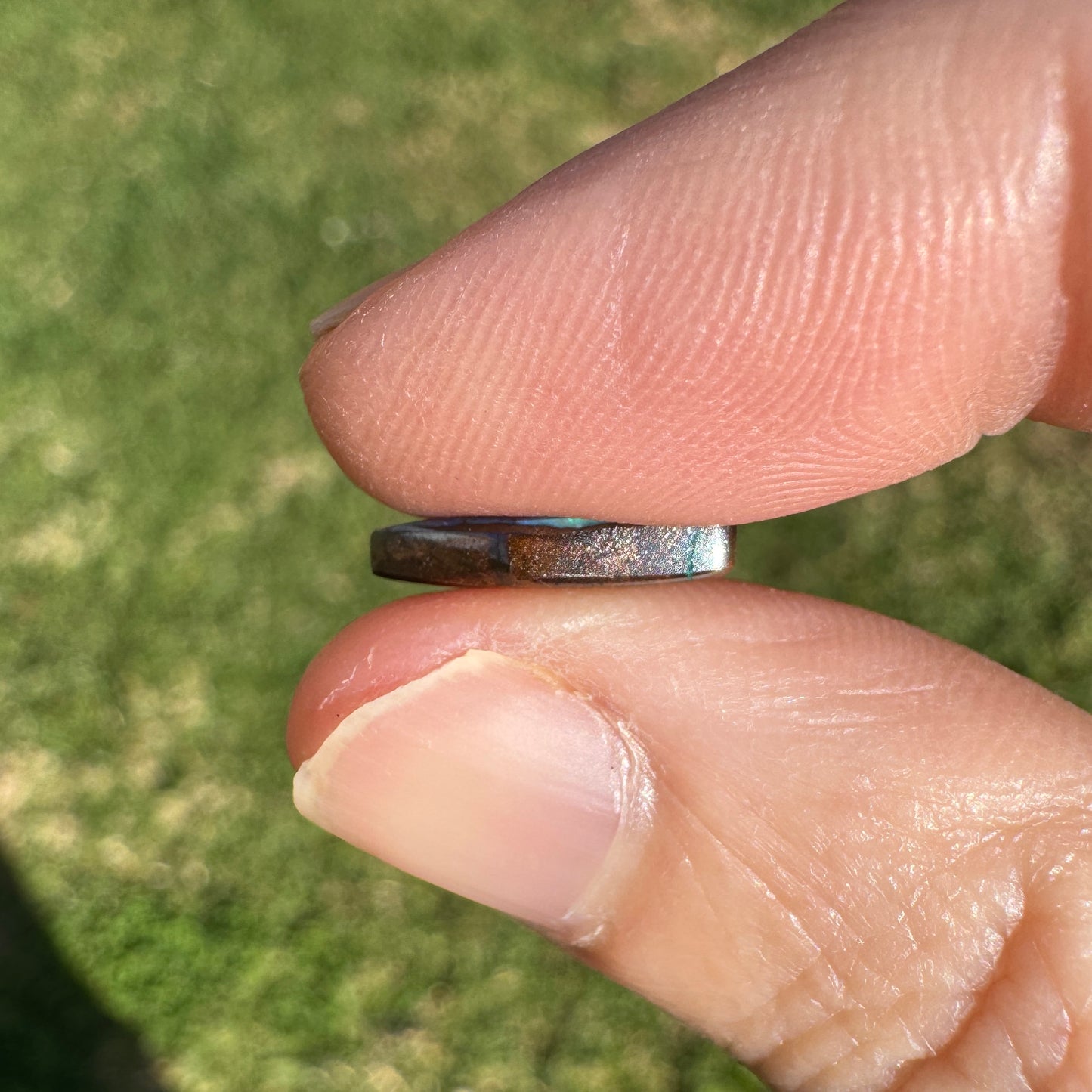 1.54 Ct small green-blue boulder opal