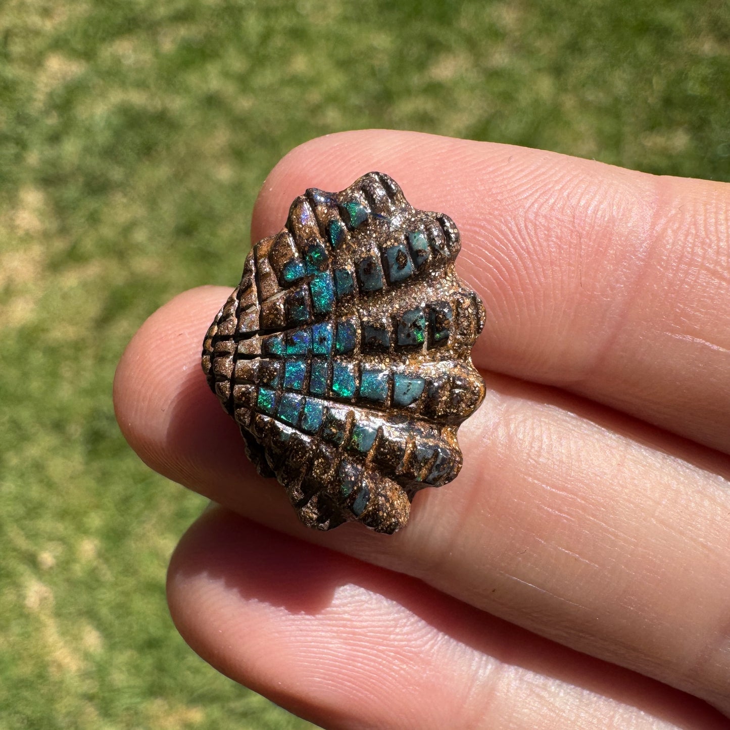 9.80 Ct fan shell boulder opal carving