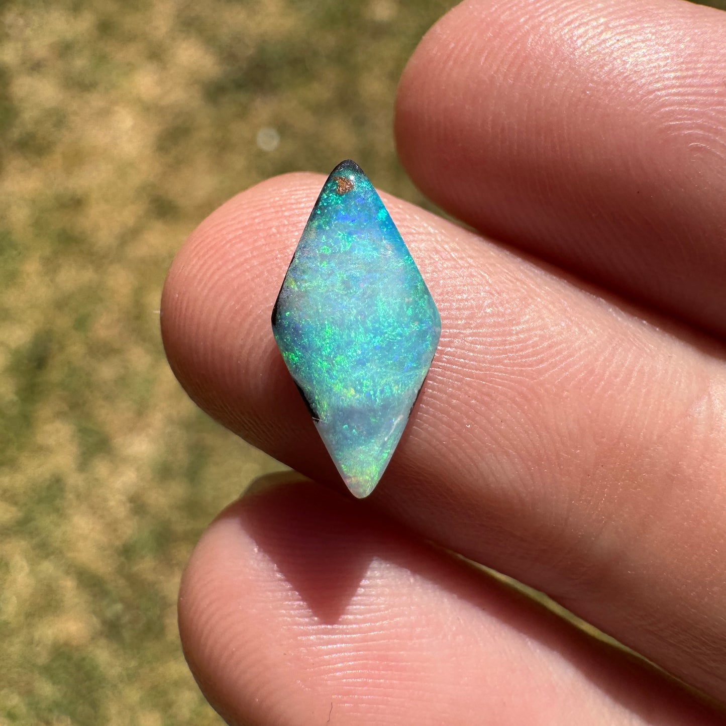 1.69 Ct small diamond shaped boulder opal