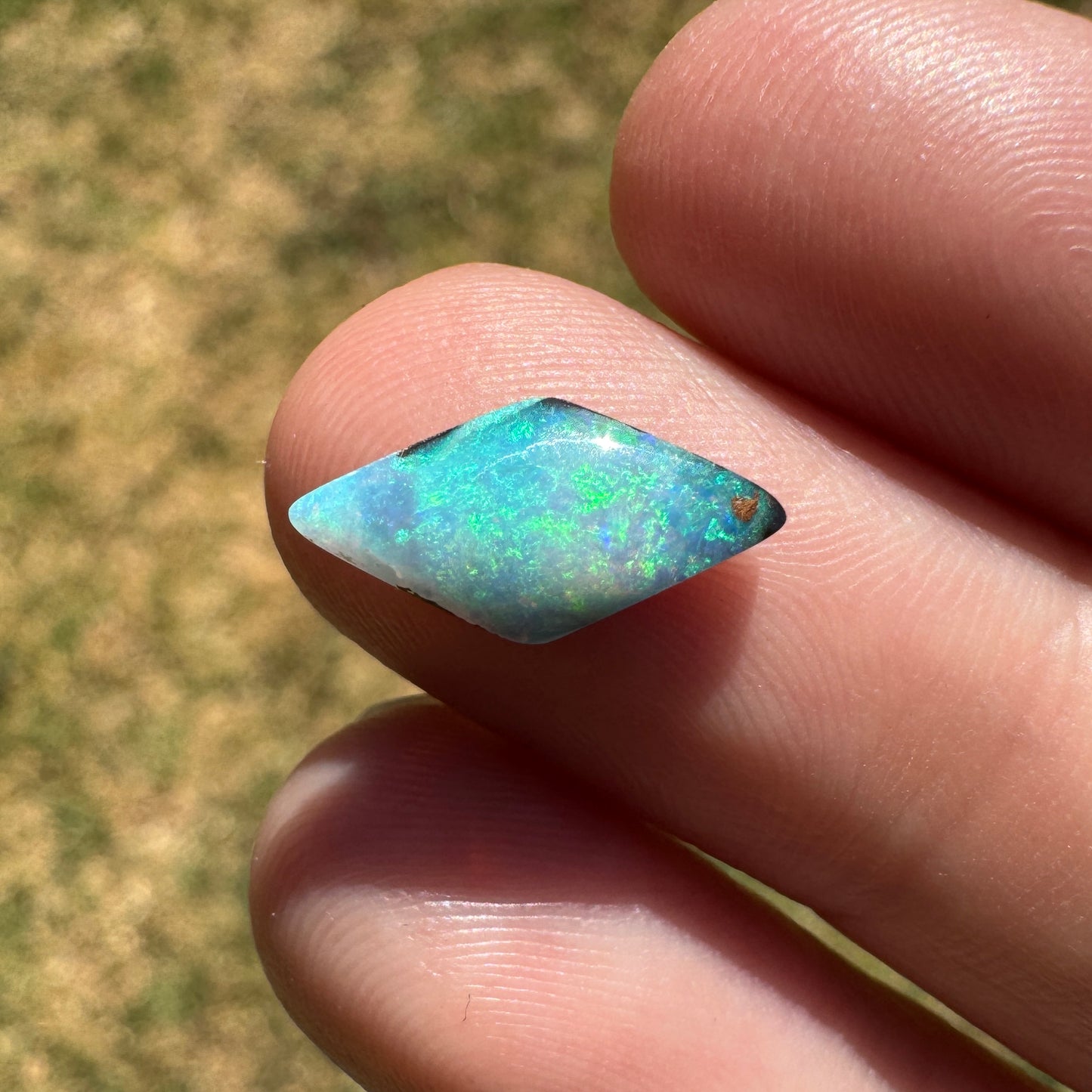 1.69 Ct small diamond shaped boulder opal