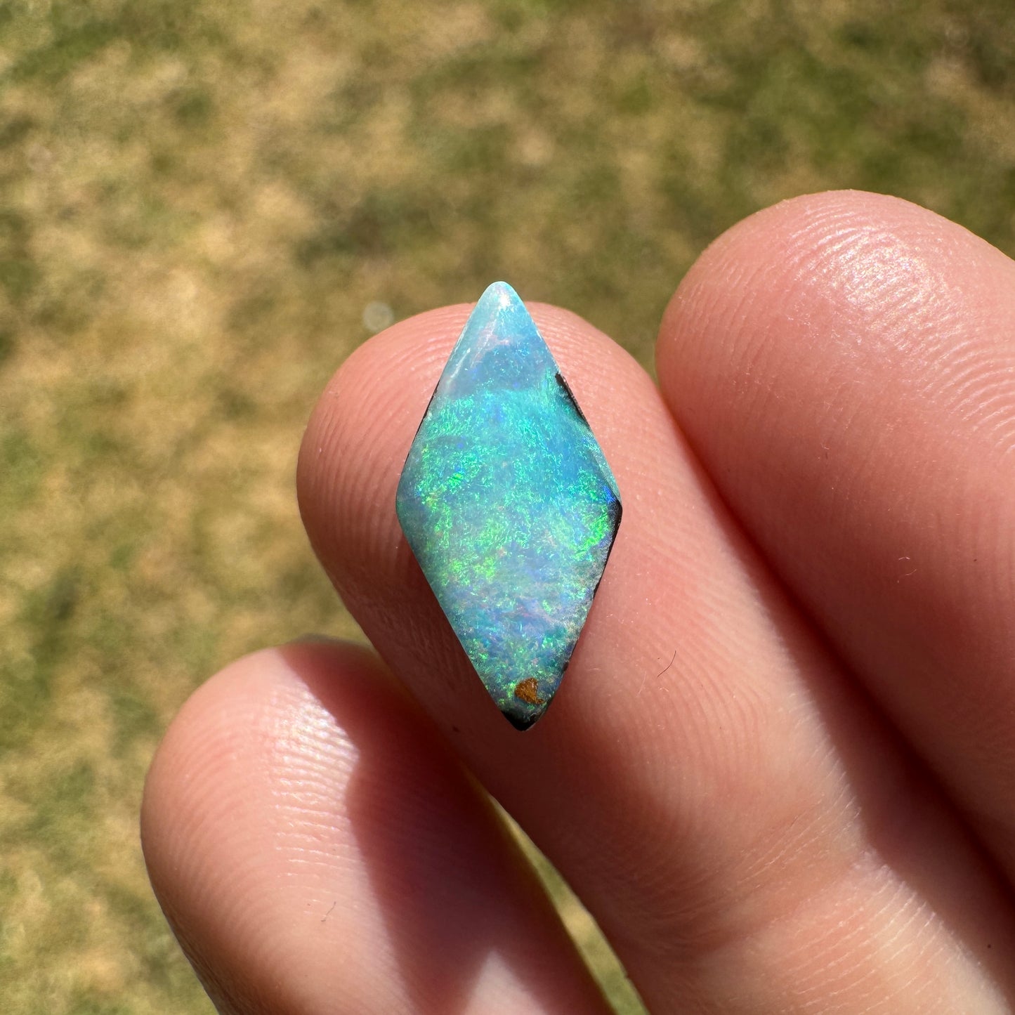 1.69 Ct small diamond shaped boulder opal